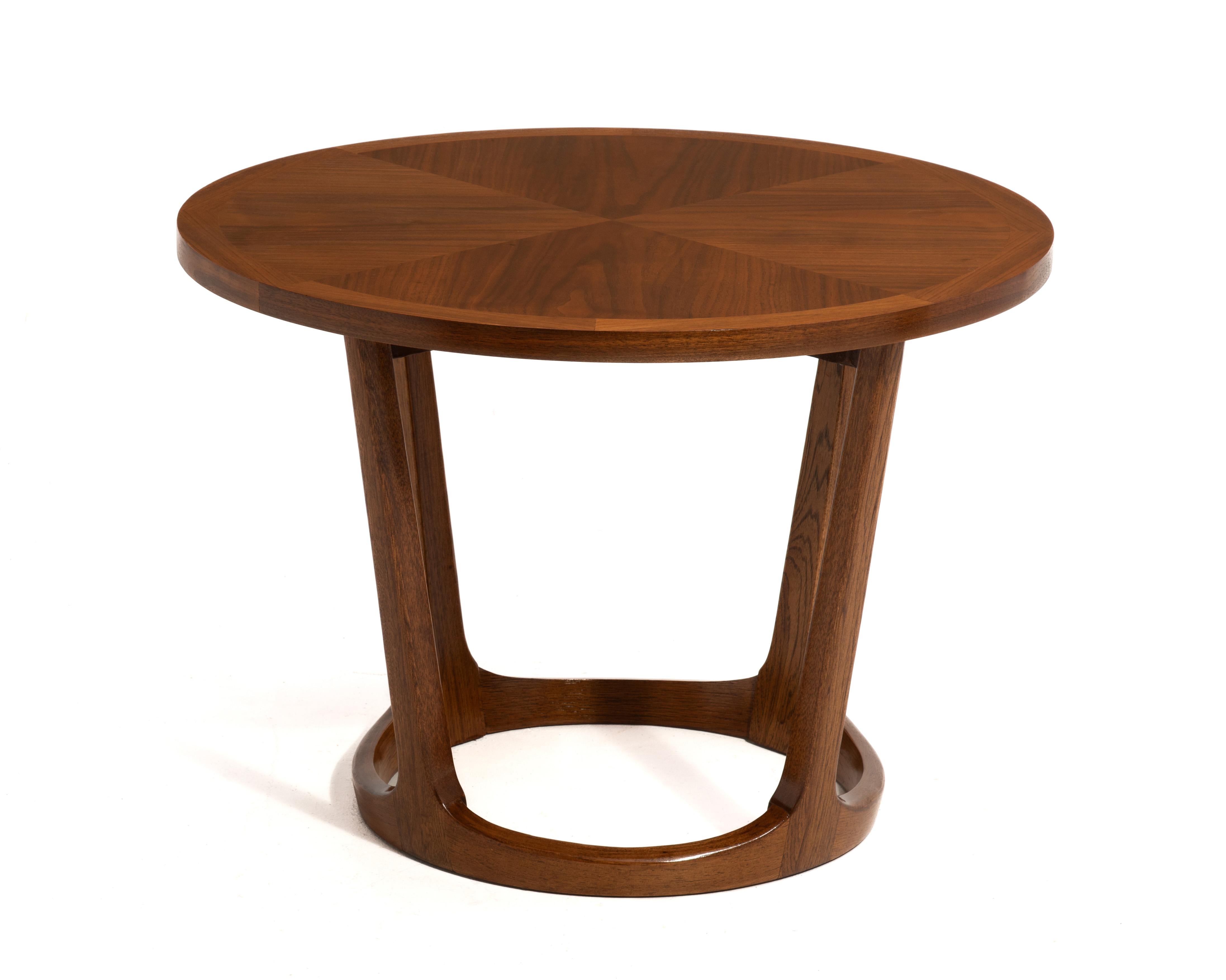 A vintage Lane Rhythm drum table featuring a book-matched veneer top with solid hardwood sculptural base. Branded underside with Lane style number 997 and serial number 362011, dating this piece to November 20, 1963. The top surface has been