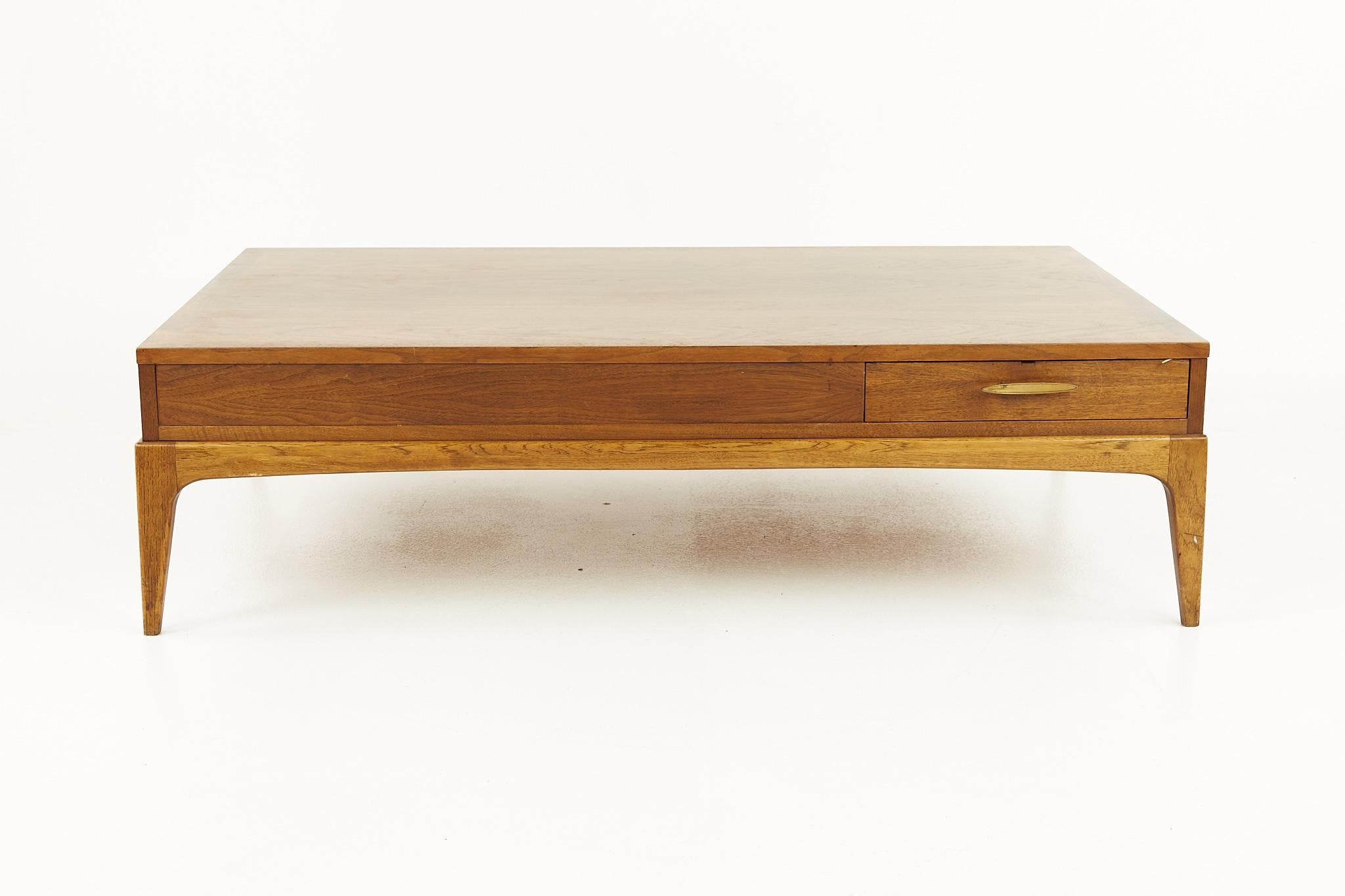 Lane Rhythm mid century coffee table with drawer

This table measures: 52.5 wide x 32.5 deep x 14.5 inches high

All pieces of furniture can be had in what we call restored vintage condition. That means the piece is restored upon purchase so