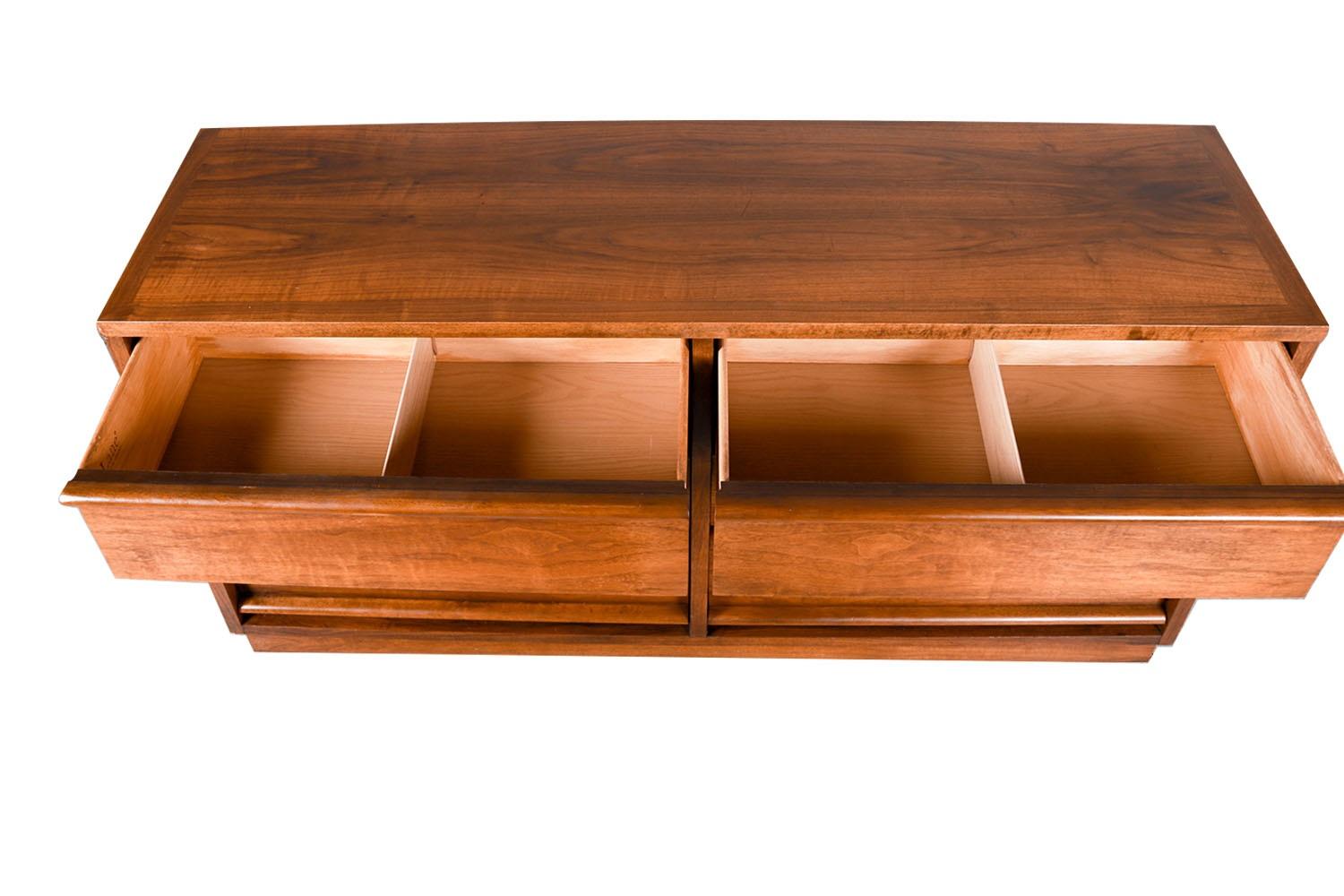 This is a beautiful example of mid-century craftsmanship by Lane furniture. This dresser is part of the Rhythm collection by Lane, built in the 1960’s, to have a style that was timeless then, and still is today. This retro piece was constructed with