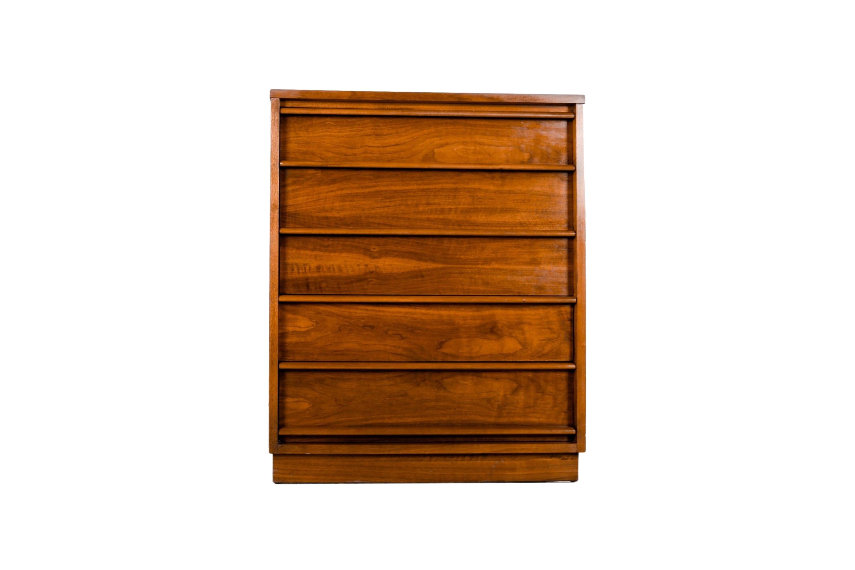 This is a beautiful example of Mid-Century craftsmanship by Lane furniture. This dresser is part of the Rhythm collection by Lane, built in the 1960’s, to have a style that was timeless then, and still is today. This retro piece was constructed with
