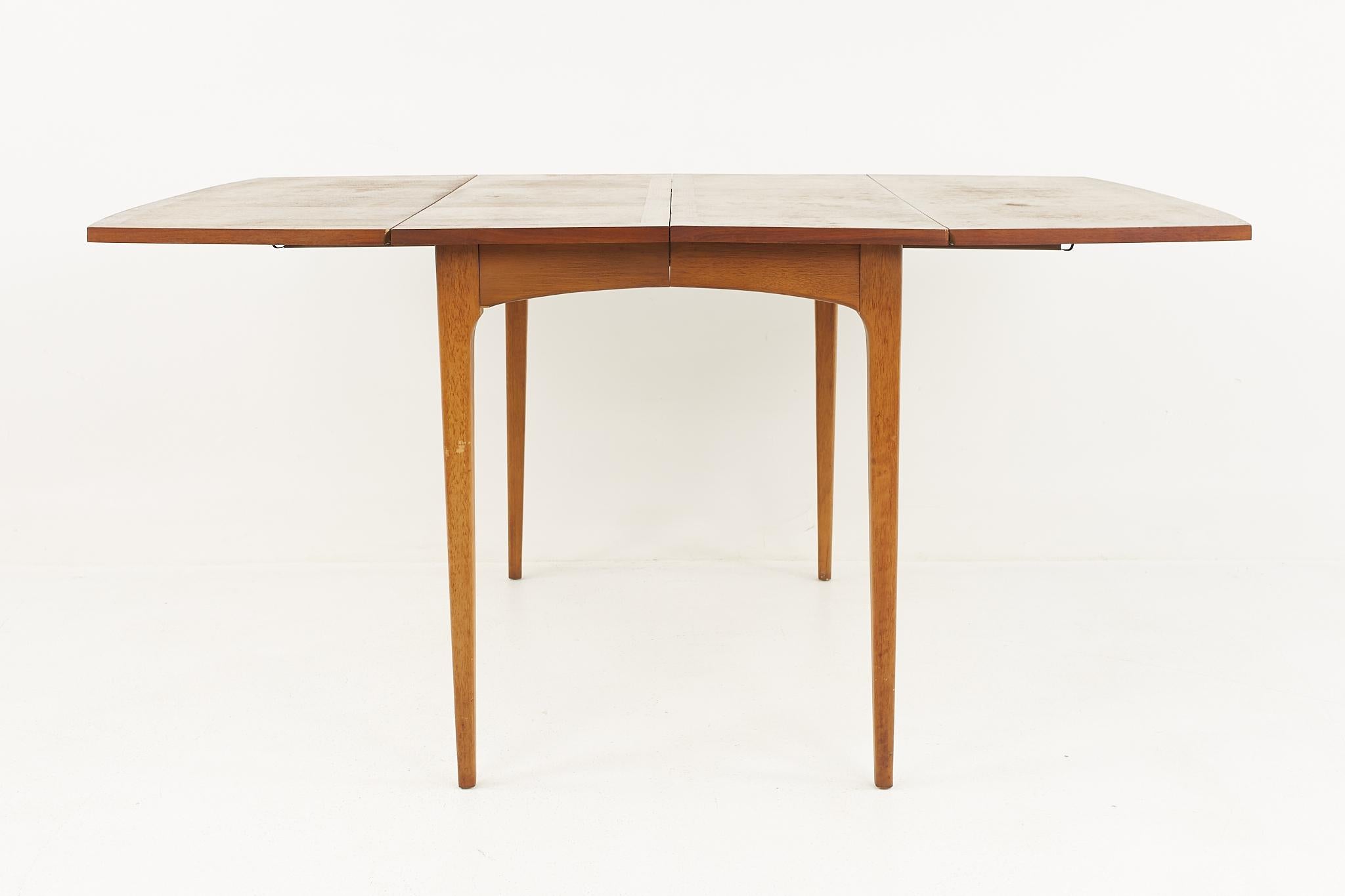 American Lane Rhythm Mid-Century Walnut Drop Leaf Expanding Dining Table with 2 Leaves For Sale