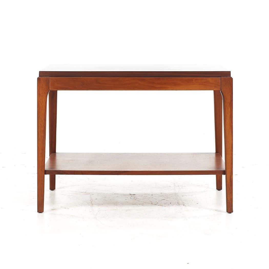 Lane Rhythm Mid Century Walnut End Table

This side table measures: 27.75 wide x 19.75 deep x 20.25 inches high

All pieces of furniture can be had in what we call restored vintage condition. That means the piece is restored upon purchase so it’s