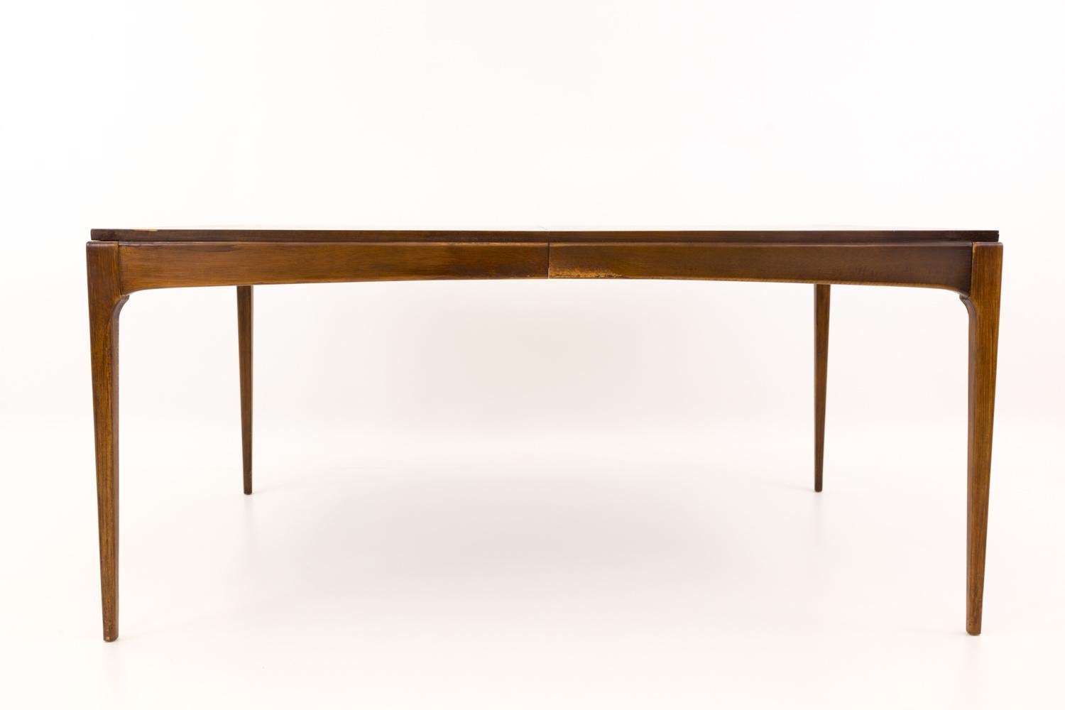 Lane Rhythm Paul McCobb Style Extra Long Wide Mid Century Dining Table

This table measures: 62 wide x 40 deep x 29.25 high, with a chair clearance of 26.25 inches, each leaf is 18 inches wide, making the maximum table width of 98 inches when both