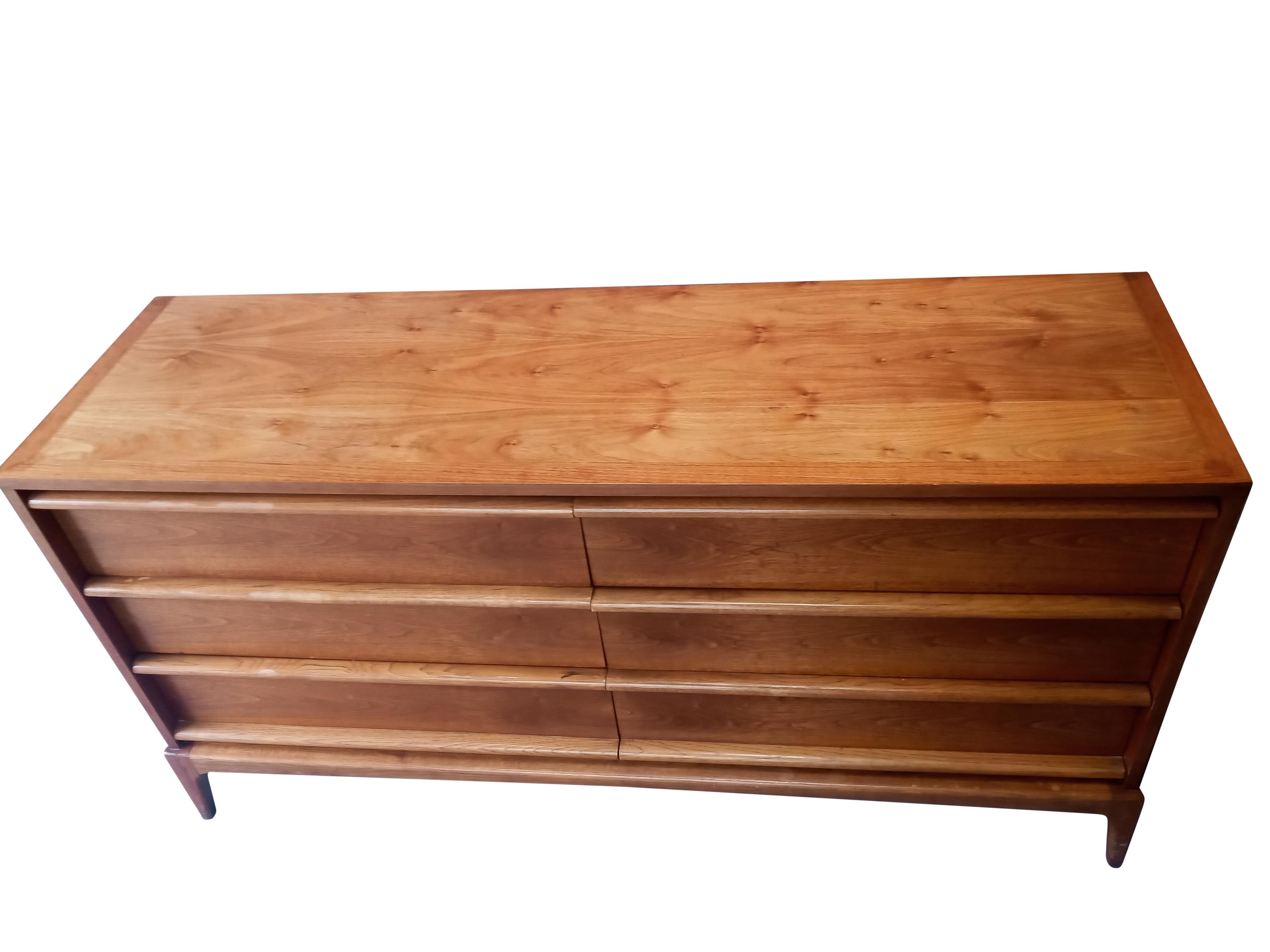 An American Mid-Century walnut double dresser from the 