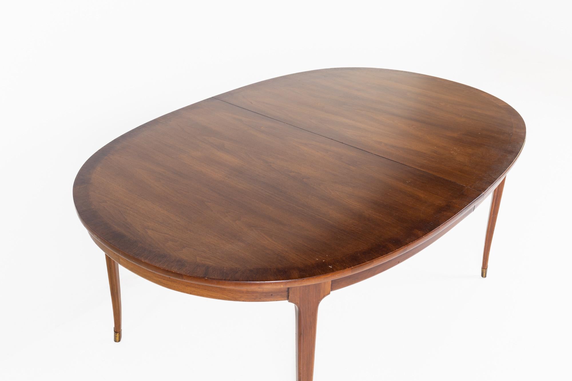 Mid-Century Modern Lane Rhythm Style Mid Century Oval Walnut Dining Table with Brass Tipped Legs an