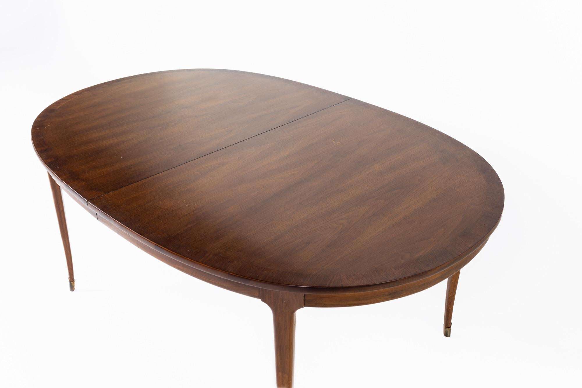 American Lane Rhythm Style Mid Century Oval Walnut Dining Table with Brass Tipped Legs an