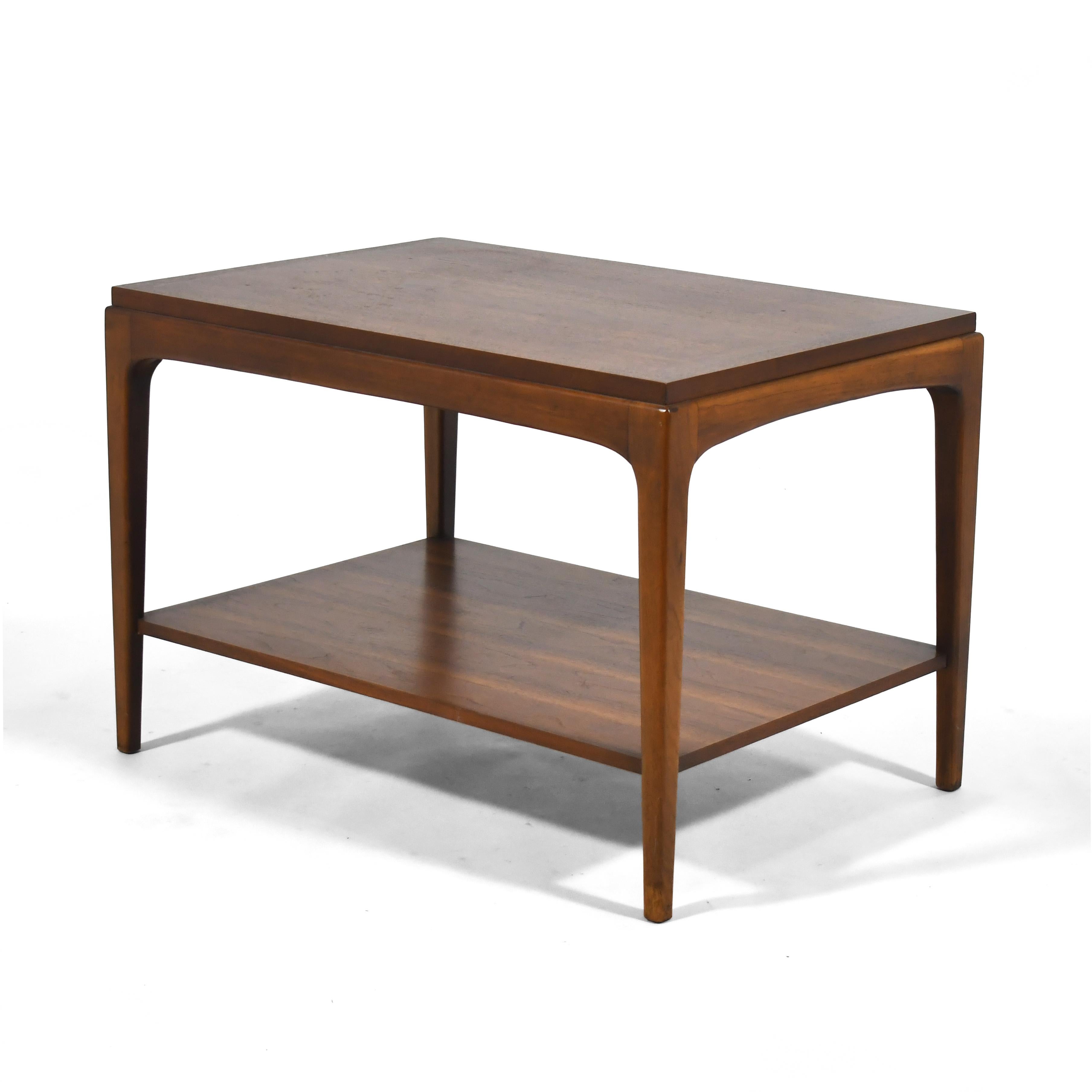 A handsome coffee table in walnut, this design from the Lane 