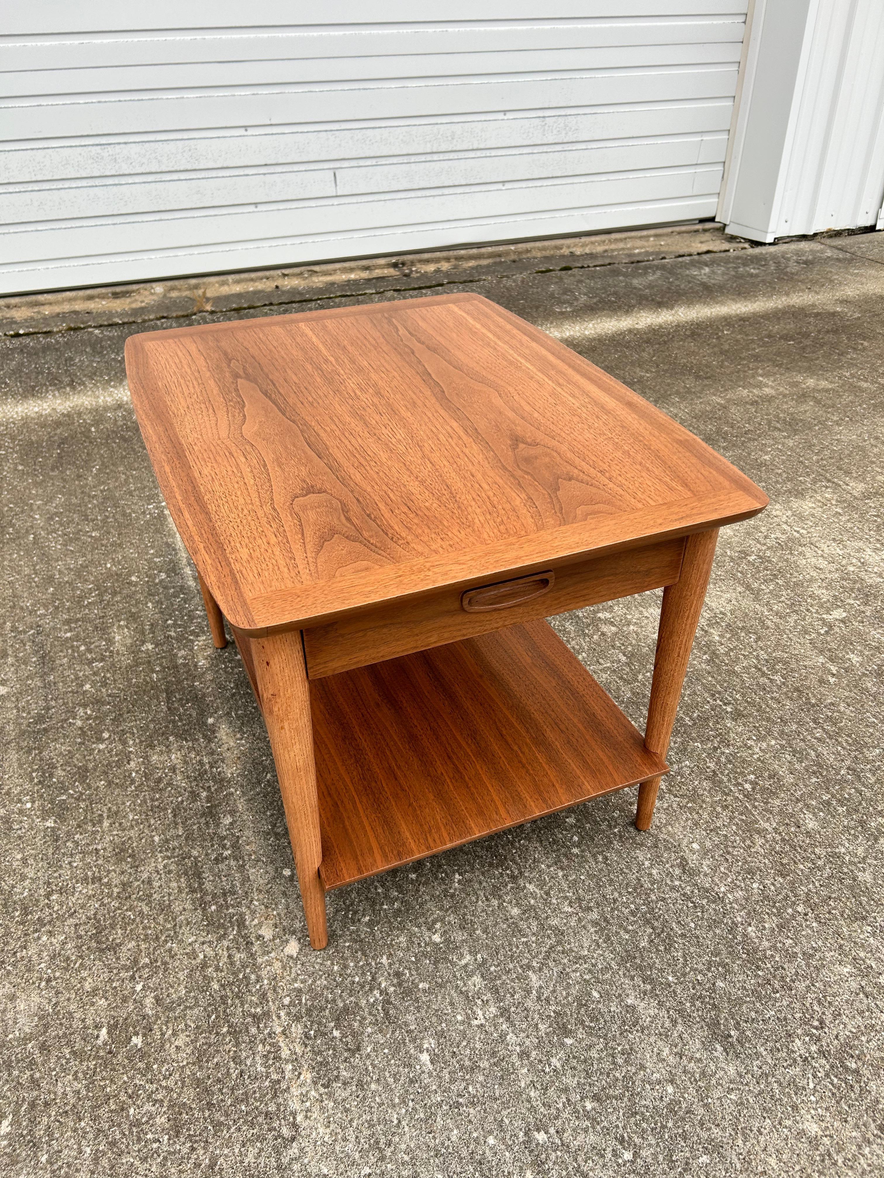 Vintage Lane Alta Vista Side End Table or Nightstand with a Single-Drawer.  This piece has been professionally refinished and is ready to be brought into your home for everyday use.

This mid-century modern classic from Lane would add a timeless