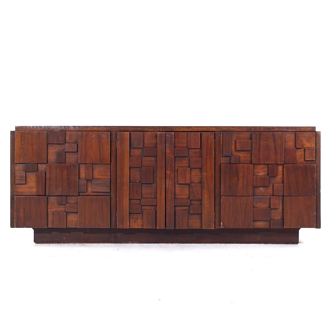 Lane Stacatto Brutalist Mid Century Walnut Lowboy Dresser

This lowboy measures: 78.25 wide x 18.75 deep x 30 inches high

All pieces of furniture can be had in what we call restored vintage condition. That means the piece is restored upon purchase