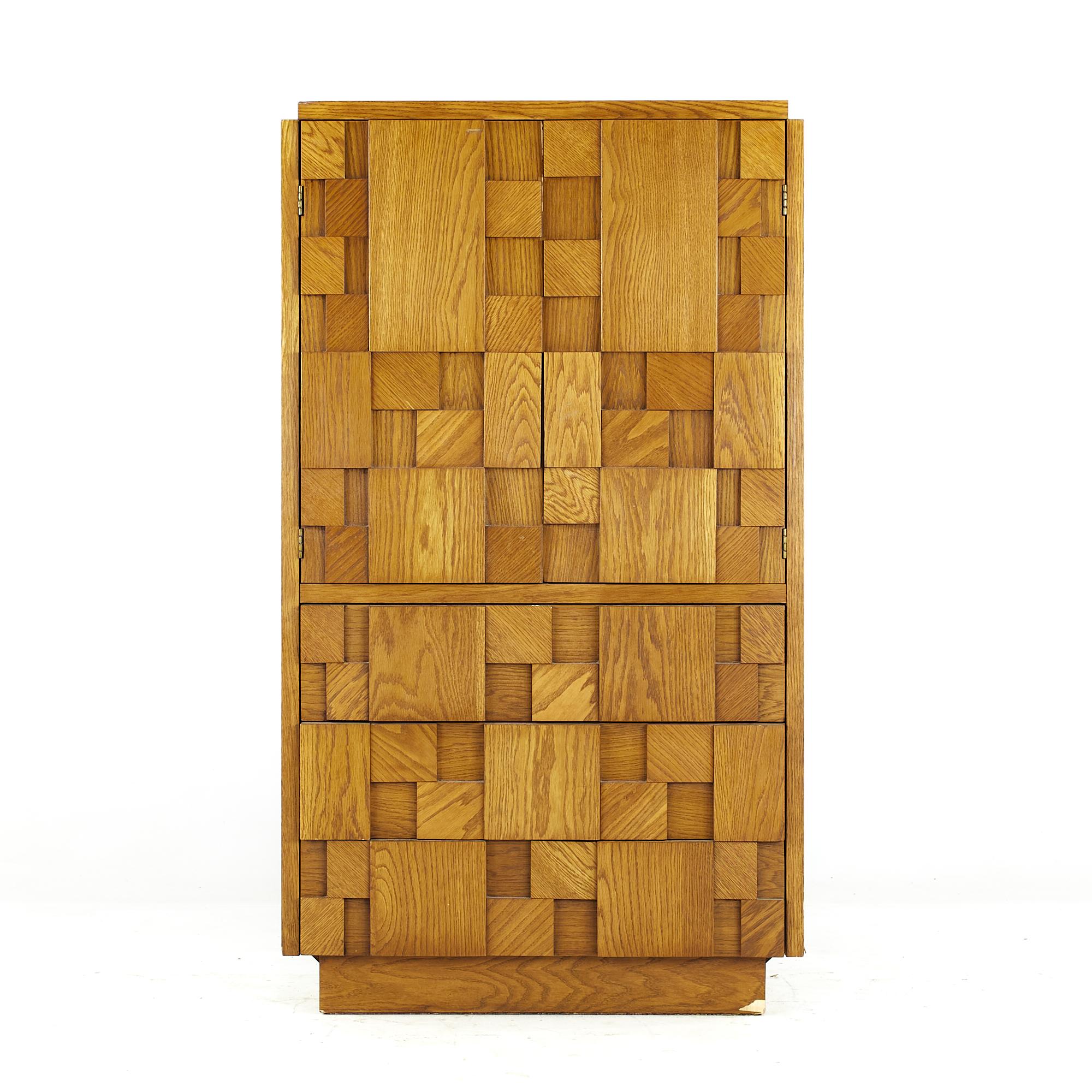 Lane Staccato Brutalist Mid Century Oak Armoire

This armoire measures: 36 wide x 19 deep x 63.25 inches high

All pieces of furniture can be had in what we call restored vintage condition. That means the piece is restored upon purchase so it’s