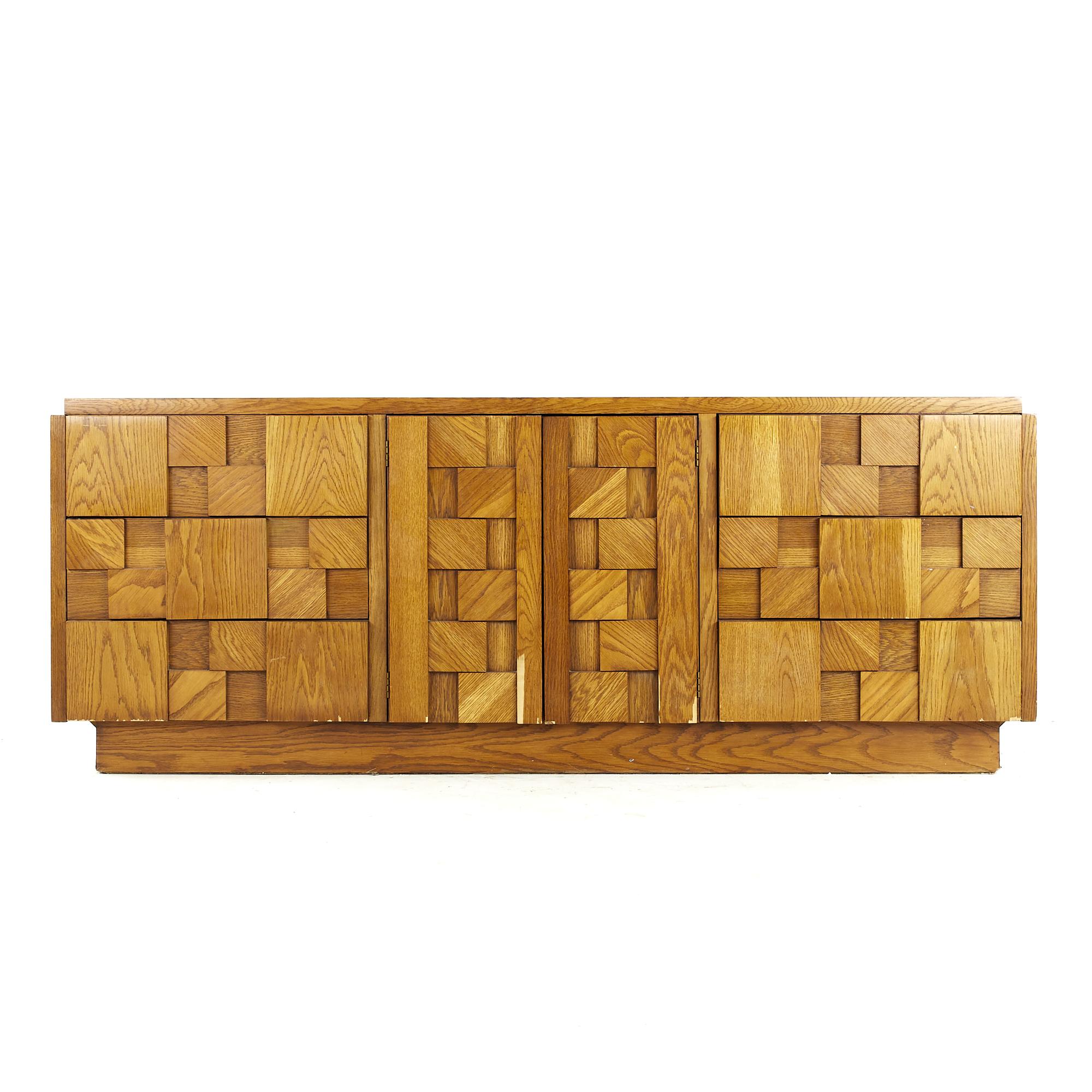 Lane Staccato Brutalist midcentury Oak Lowboy Dresser

This lowboy measures: 78 wide x 19 deep x 30 inches high

All pieces of furniture can be had in what we call restored vintage condition. That means the piece is restored upon purchase so