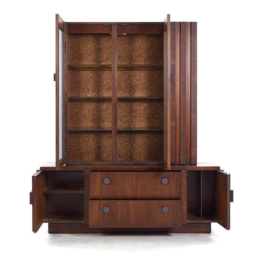 Lane Staccato Brutalist Mid Century Walnut Buffet and Hutch

The buffet measures: 66 wide x 19.25 deep x 24 inches high
The hutch measures: 48 wide x 12 deep x 52 inches high
The combined height of the buffet and hutch is 76 inches

All pieces of