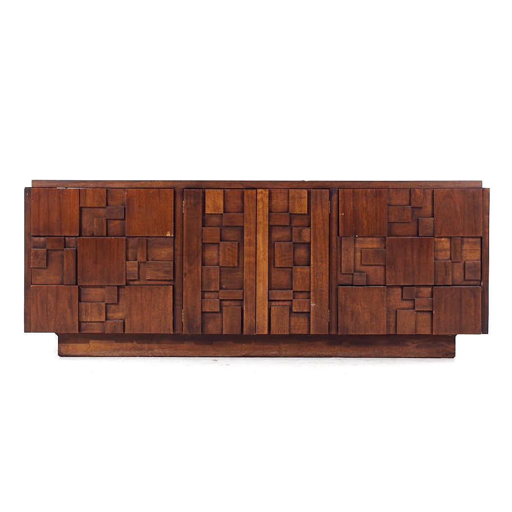 Lane Staccato Brutalist Mid Century Walnut Lowboy Dresser

This lowboy measures: 78 wide x 18.5 deep x 30 inches high

All pieces of furniture can be had in what we call restored vintage condition. That means the piece is restored upon purchase so
