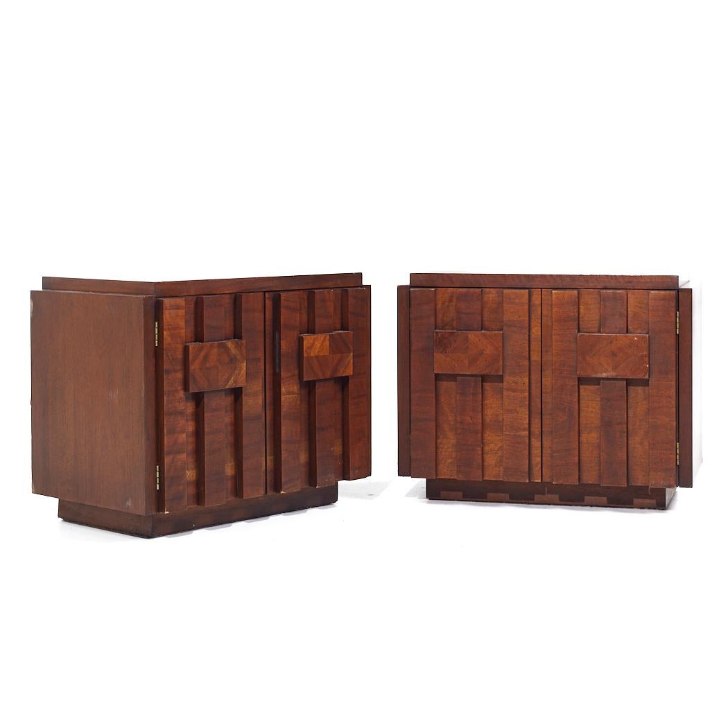 Lane Staccato Brutalist Mid Century Walnut Nightstands - Pair

Each nightstand measures: 28 wide x 17.25 deep x 22.25 inches high

All pieces of furniture can be had in what we call restored vintage condition. That means the piece is restored upon