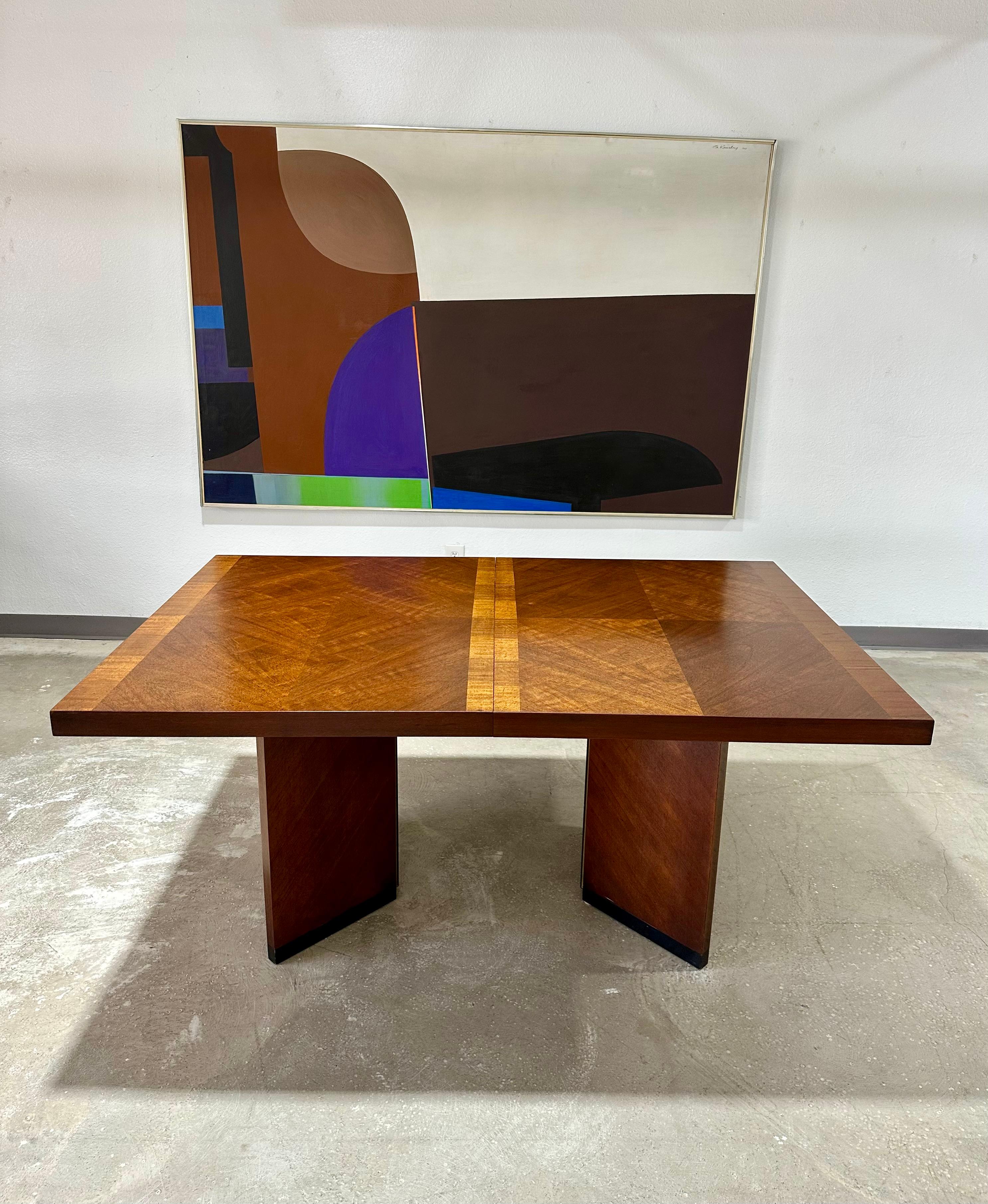 Vintage Mid Century Lane Staccato Dining Brutalist Dining Table circa 1970’s. Walnut parquetry top dining table that extends with two leaves (not self stowed), rests on triangular hinged legs which can be removed and folded for transport. (Matching