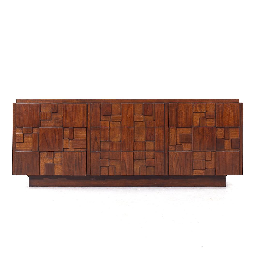 Lane Staccato Mid Century Brutalist Walnut Lowboy Dresser

This lowboy measures: 78 wide x 18.75 deep x 30.25 inches high

All pieces of furniture can be had in what we call restored vintage condition. That means the piece is restored upon purchase