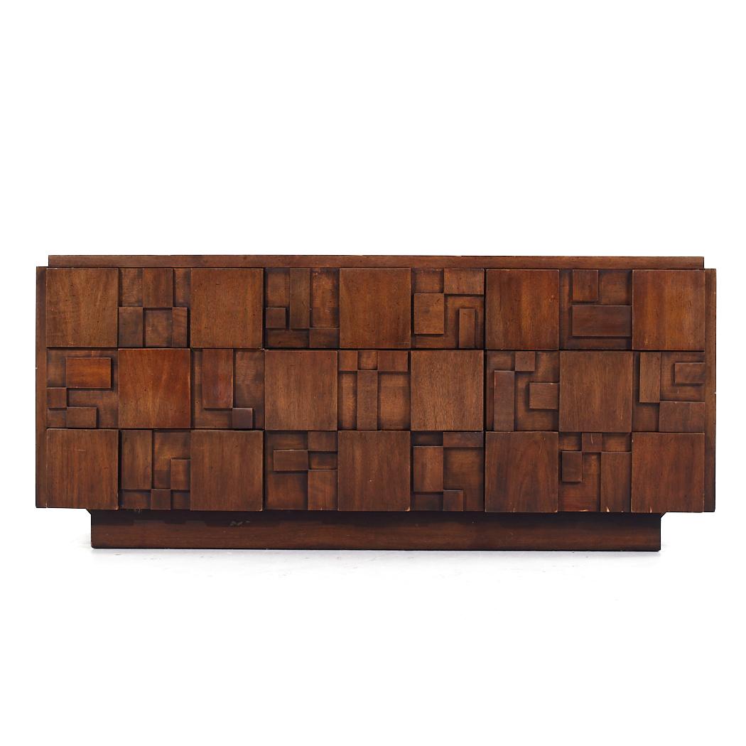 Lane Staccato Mid Century Walnut Brutalist Lowboy Dresser

This lowboy measures: 68.5 wide x 19 deep x 30 inches high

All pieces of furniture can be had in what we call restored vintage condition. That means the piece is restored upon purchase so