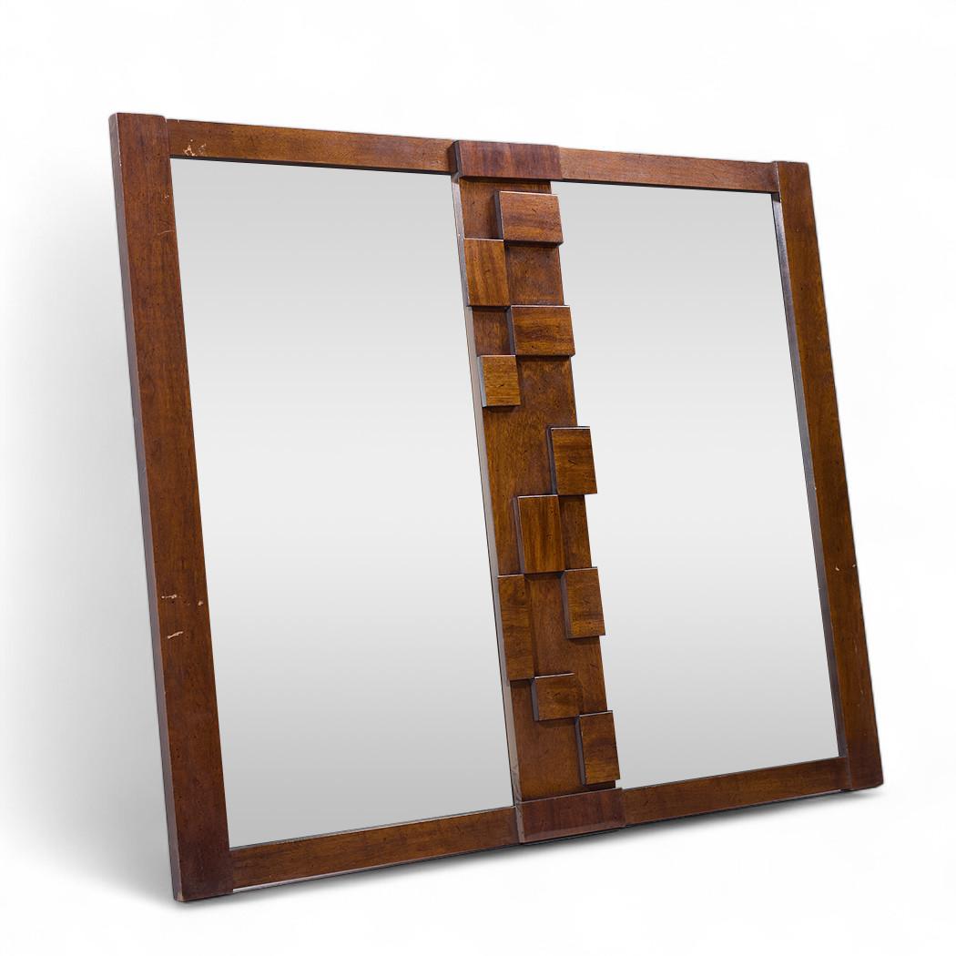 Lane Staccato Mid Century Walnut Brutalist Mirror

This mirror measures: 51.5 wide x 1 deep x 41.5 inches high

We take our photos in a controlled lighting studio to show as much detail as possible. We do not Photoshop out blemishes.

This item is