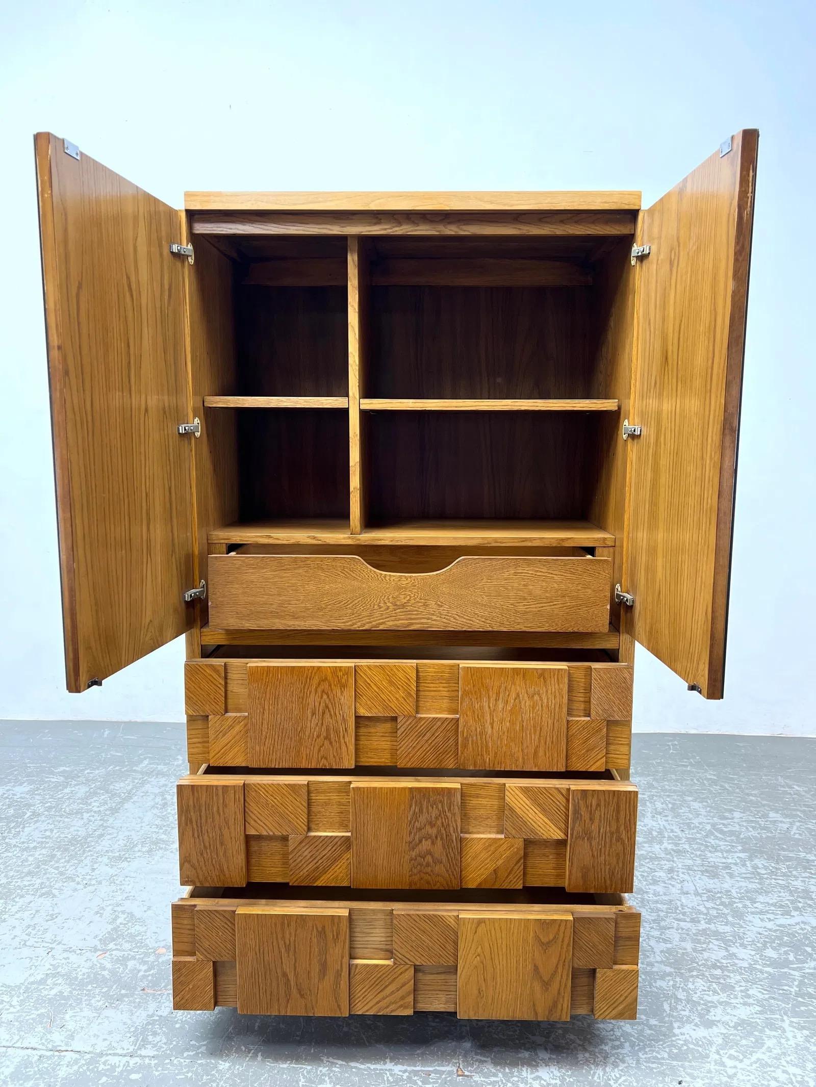 Features bold heavy oak wood mosaic on the front drawers. Double mirrored doors. Staccato series by Lane.
