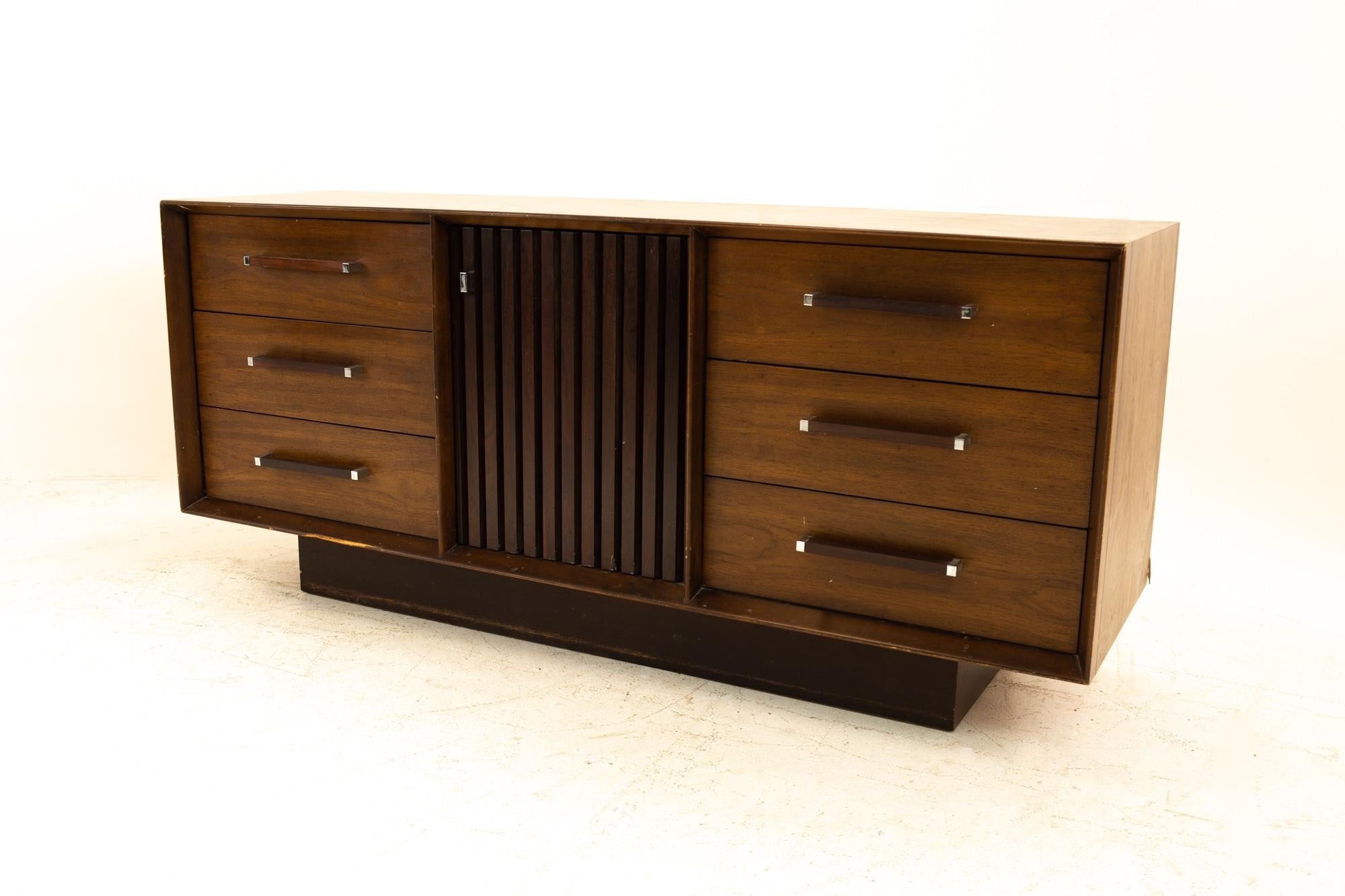 Lane Tower suite mid century walnut and rosewood lowboy
Dresser measures: 66.5 wide x 19 deep x 29.5 high

All pieces of furniture can be had in what we call restored vintage condition. That means the piece is restored upon purchase so it’s free