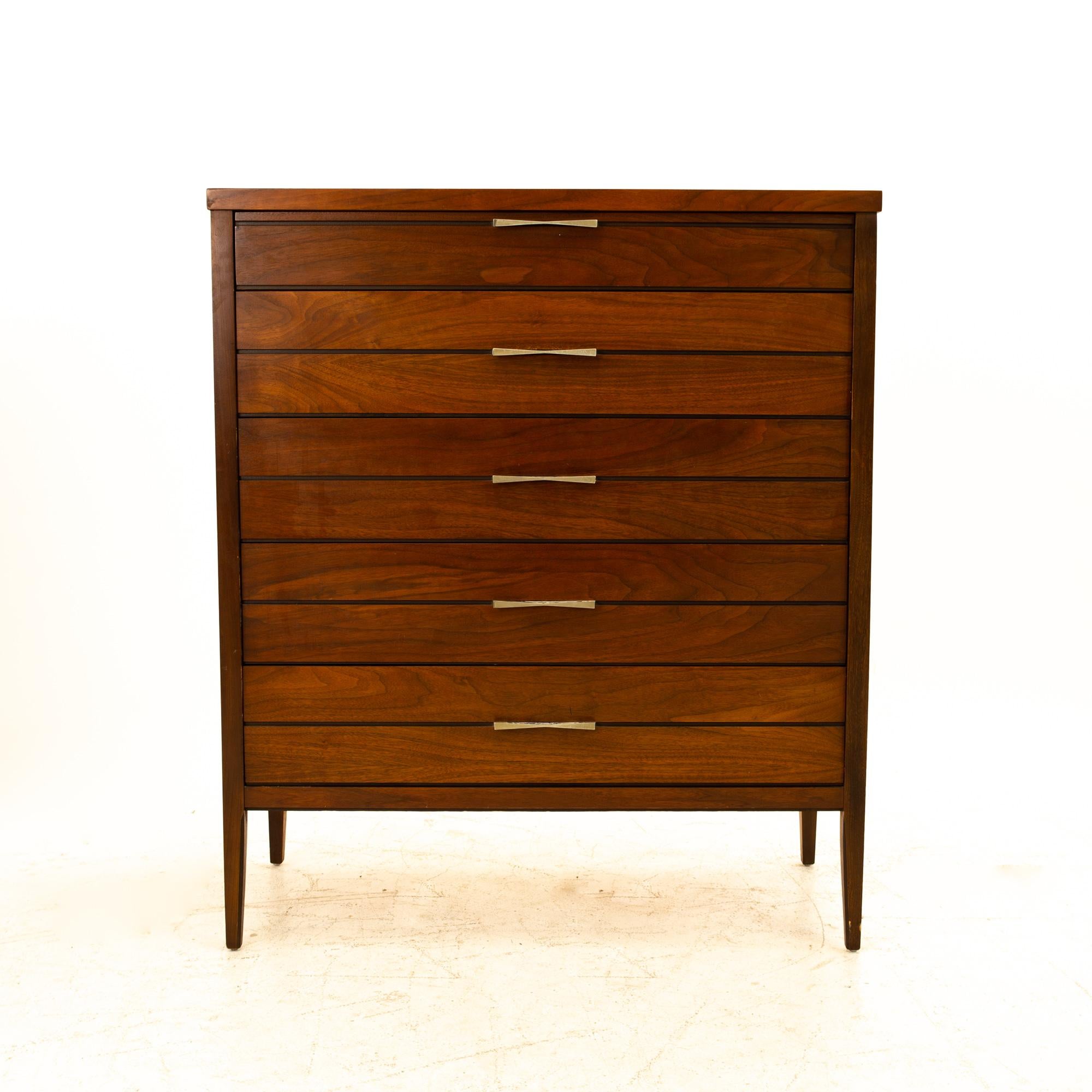 Lane Tuxedo midcentury walnut bow-tie highboy dresser
Dresser measures: 38.25 wide x 18 deep x 45 high

All pieces of furniture can be had in what we call restored vintage condition. That means the piece is restored upon purchase so it’s free of