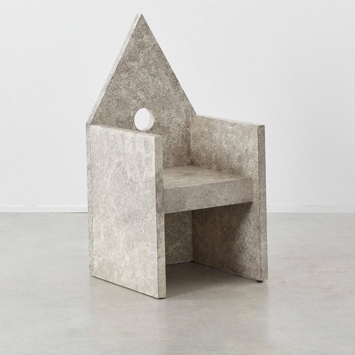 Boasting a throne-like silhouette, the ‘Vescovina’ armchair was designed in 1986 by Italian architect Lanfranco Benvenuti (1937-1989) for Meccani Design. The timber construction form takes inspiration from bishop chairs in Italian churches.

It is a