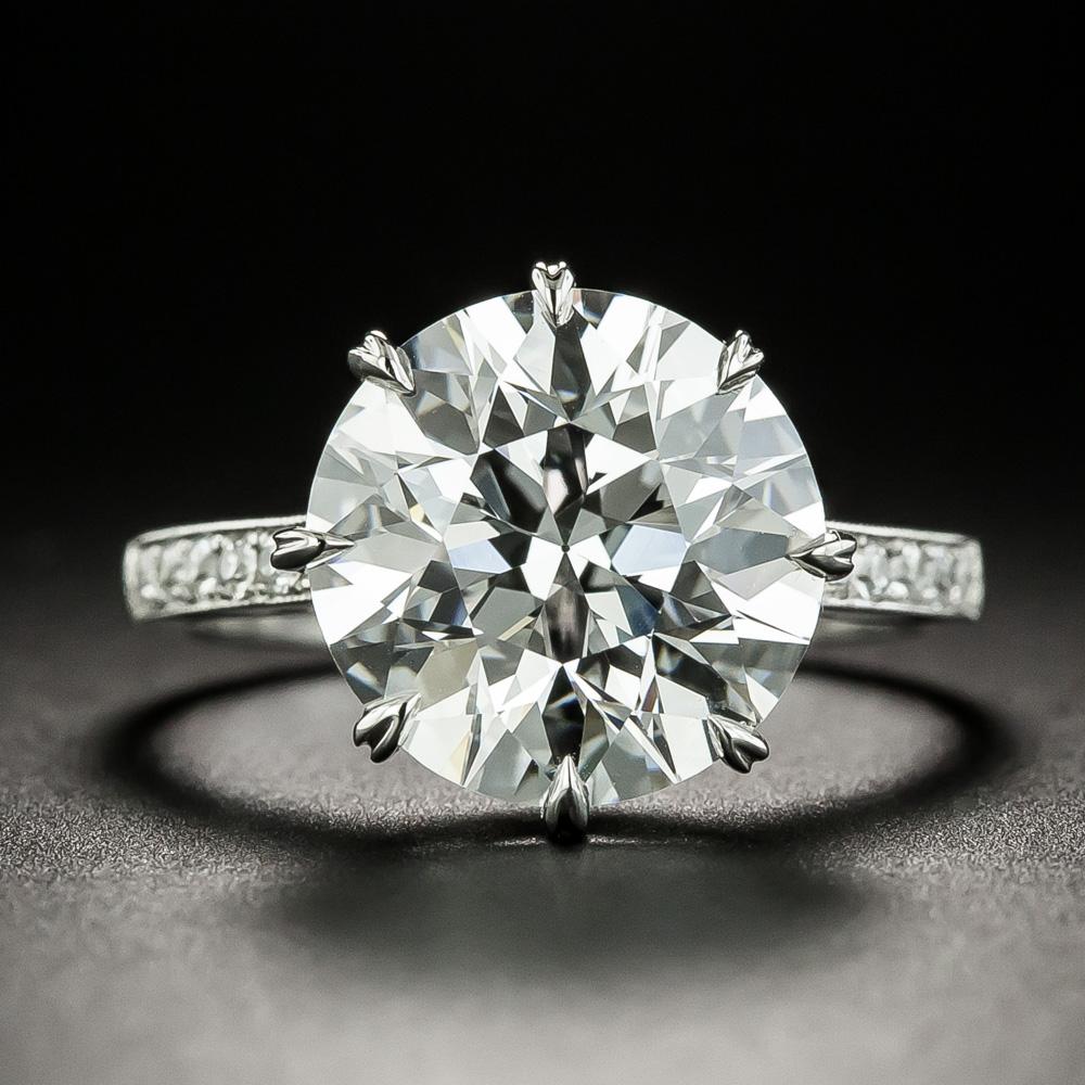 A scintillating, ultra-sizzling, icy-white transitional European-cut/round brilliant-cut diamond, circa 1930, is accompanied by a GIA Diamond Grading Report stating: F color - VS1 clarity and beams brilliantly from within a classic vintage style