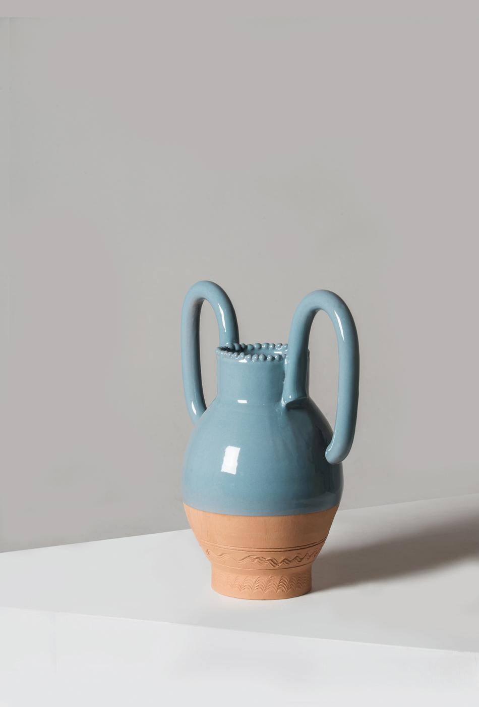 Following on a series of vases made with Mexican artisans, Sam Baron continues his exploration into what makes an object belong to a certain territory. Langiu (tall) Vase and Cruciu (short) Vase are two versions of the humble terracotta water jug