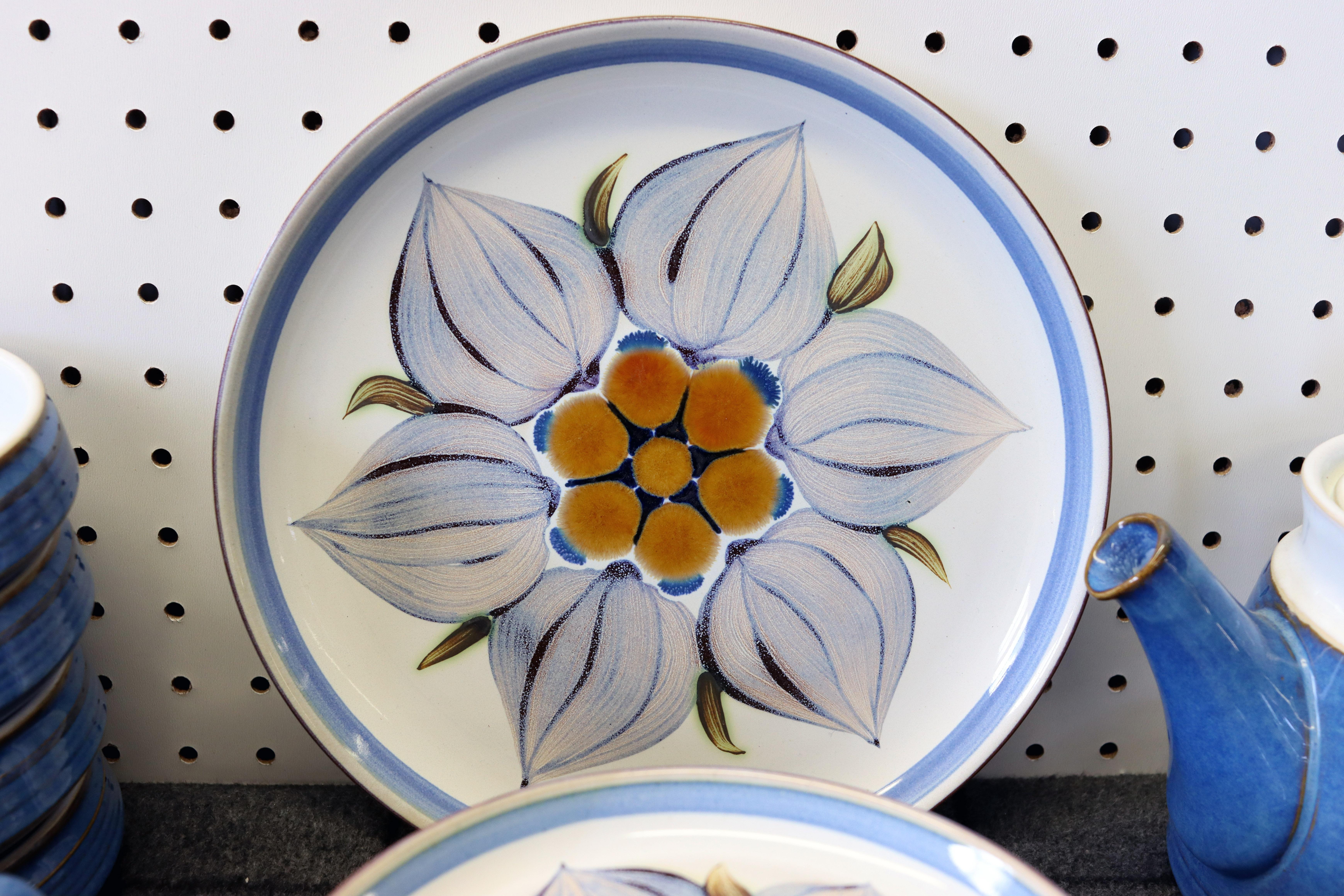 Complete service for four with midcentury flair! This Langley dish set made in England includes everything you need to set the table for family or guests. Offer entree, salad, dessert and post-meal coffee or tea with this 29-piece