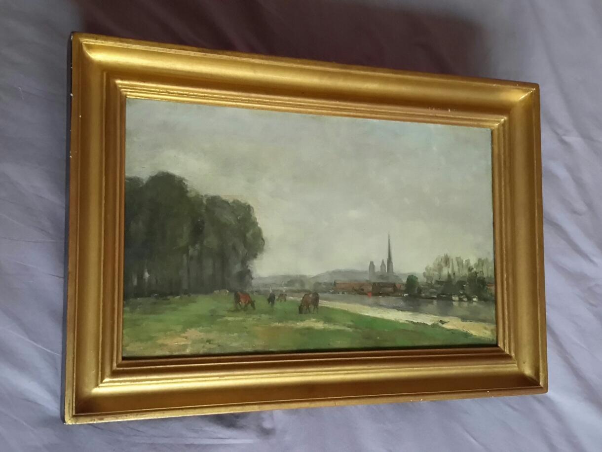 Charming impressionist oil on canvas from the late 19th century representing a view of a quay in Rouen on the Seine with a herd on pasture and Rouen Cathedral in the background.
The painting is in very good condition, it has been restored and