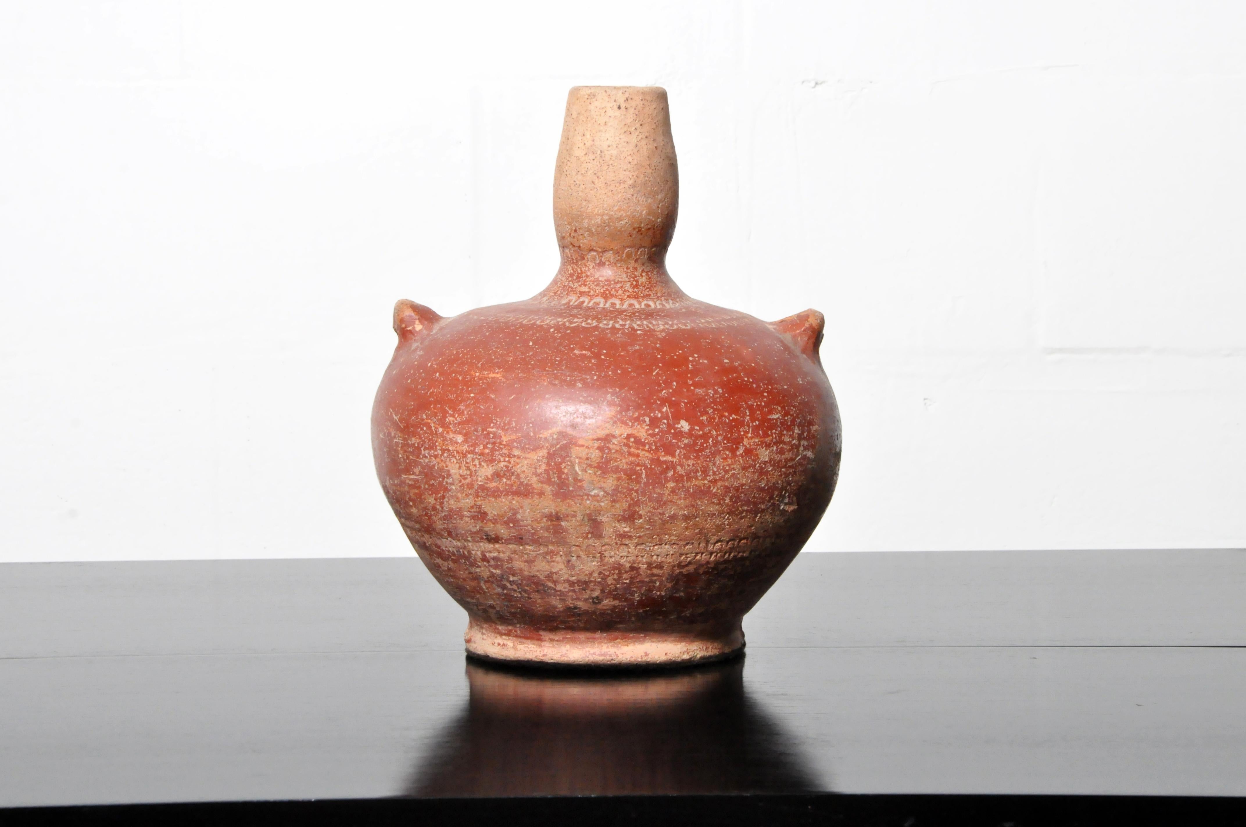 This water jar is from Thailand and was made from clay, c. 20th century. Wear consistent with age and use.
  