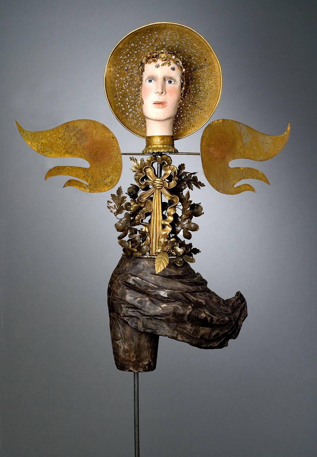 Lannie Hart Figurative Sculpture - "Winged Virgin", female figure of wood, steel wings and golden halo