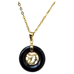 Lantau Zhong Black Onyx Dragon Donut 16mm Pendant (with 14K Solid Yellow Gold)