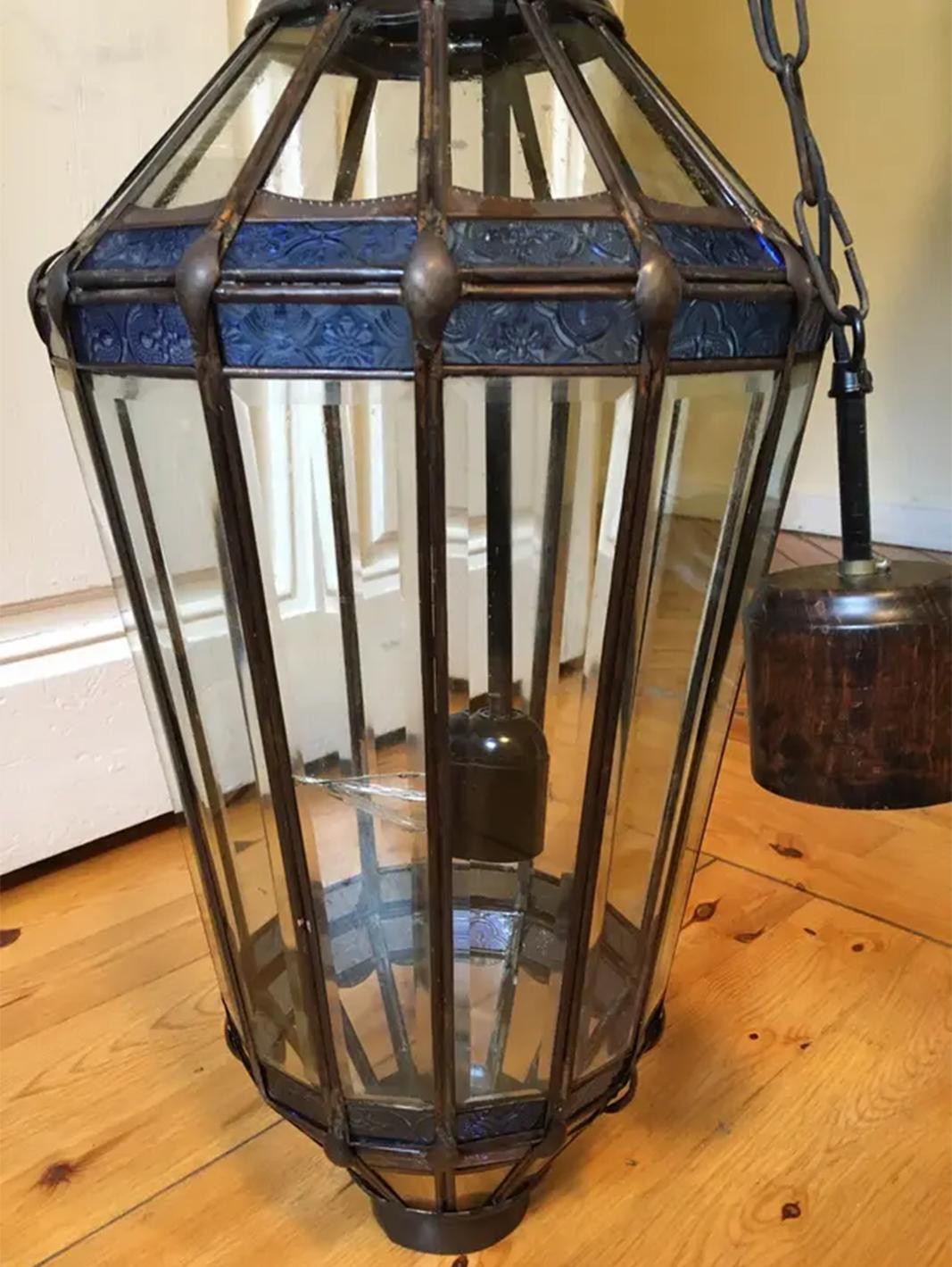 Lantern -Andalusian for portal or room, bevelled and leaded glass, black

painted metal. Measure: 50 cm tall.