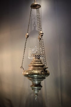 A very fine silver over bronze repousse and chased pendant