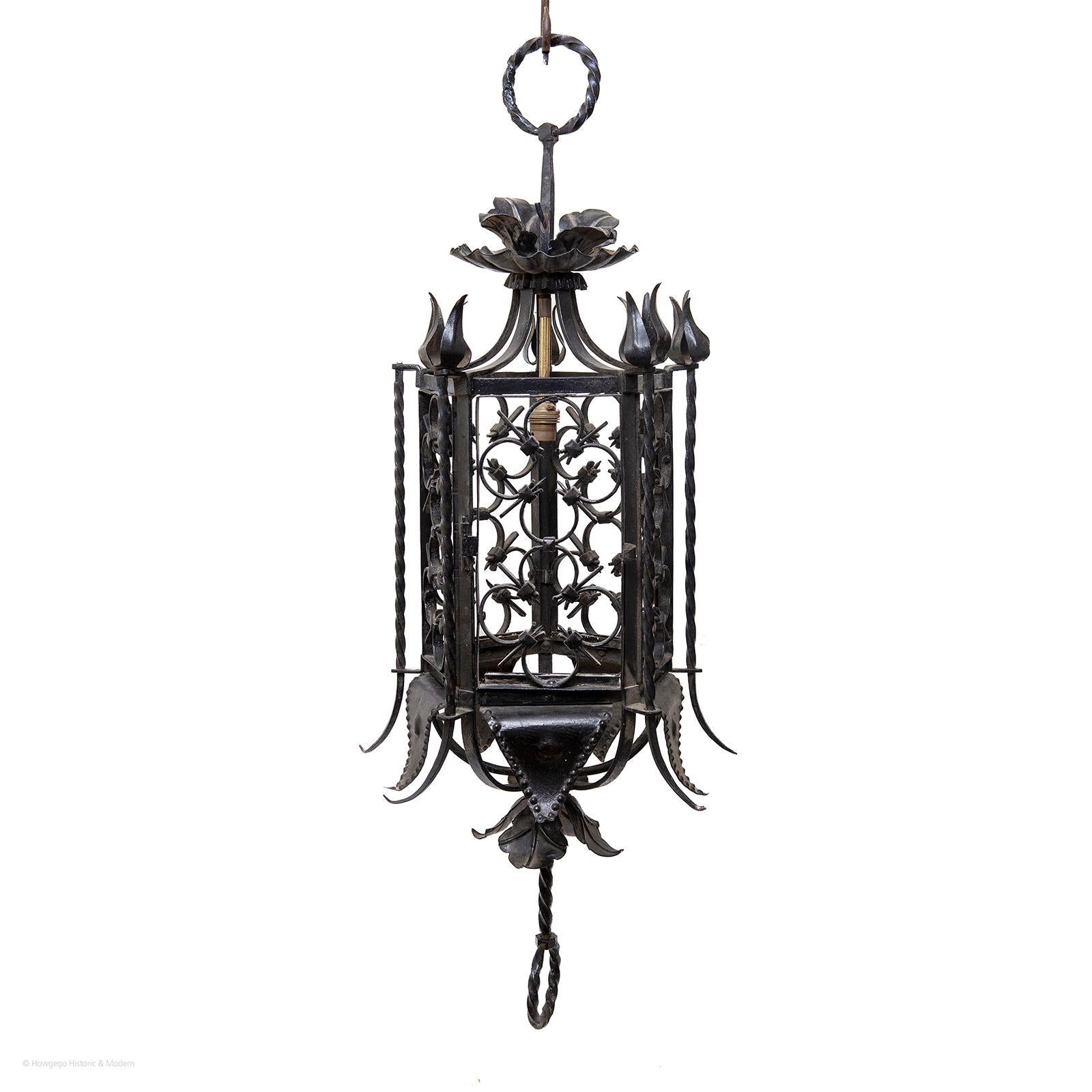 STRIKING, 19TH CENTURY, SPANISH IRON, PENTAGONAL LANTERN, ELECTRIFIED - 96cm., 38” high

Spanish metalwork is renowned for its quality & this striking lantern exudes gravitas
Iron ring above four shaped leaves and a bowl at the top. Each side