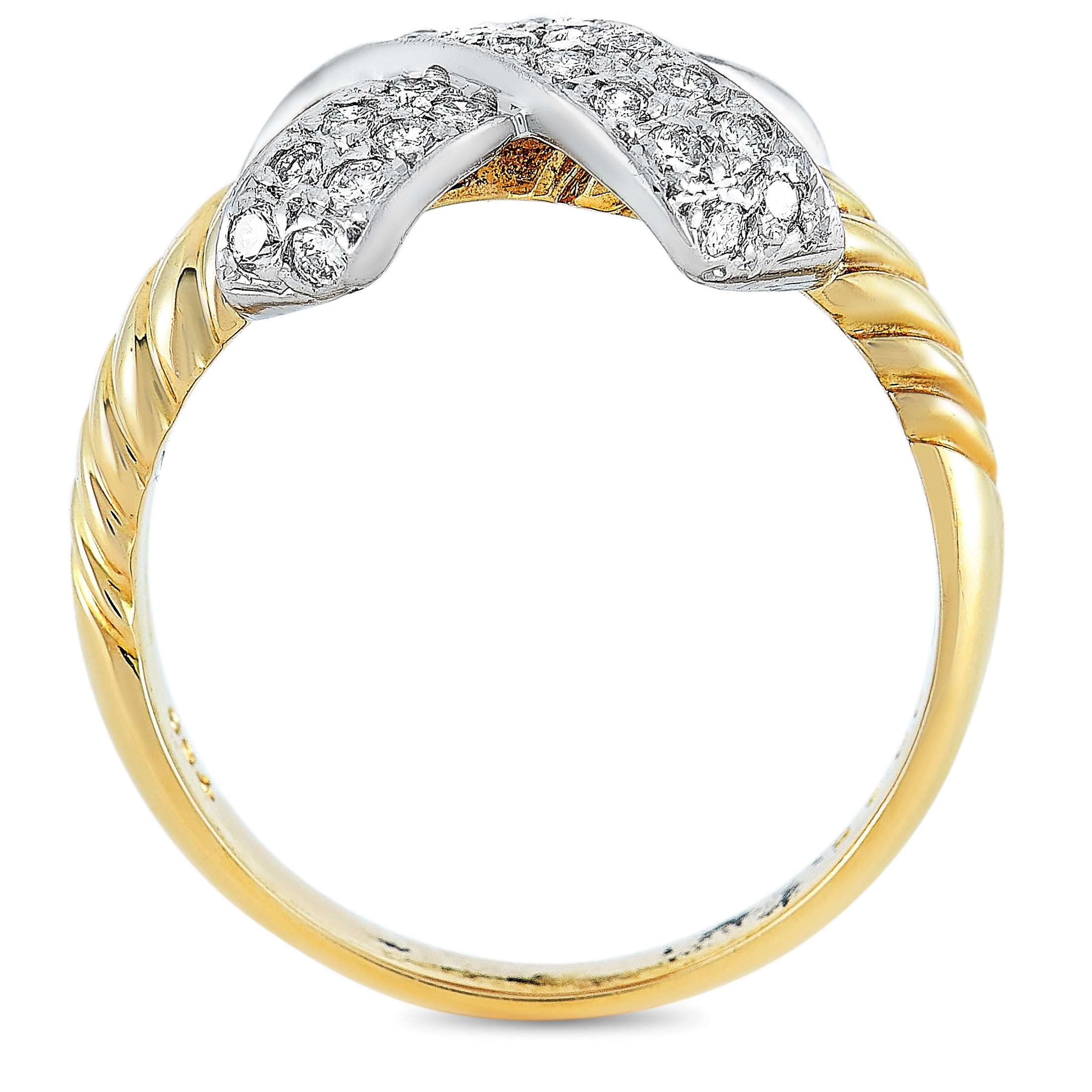 This Lanvin ring is made out of 18K yellow and white gold and embellished with diamonds that total 0.45 carats. The ring weighs 5.5 grams and boasts band thickness of 3 mm and top height of 3 mm, while top dimensions measure 12 by 10 mm.
 
 Offered