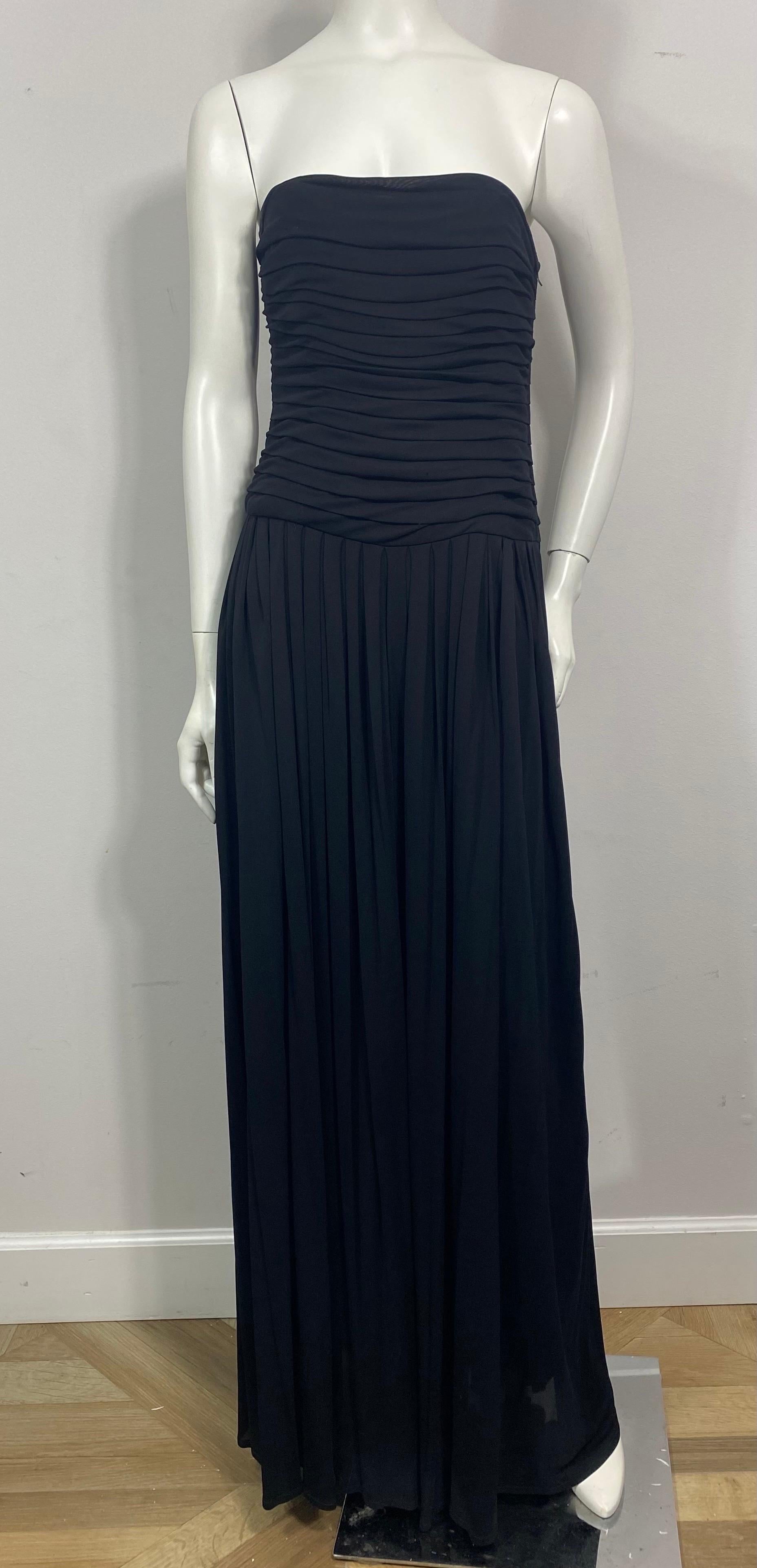 Lanvin 1970’s Black Shutter Pleat Matte Jersey Strapless Long Dress-Size 40. This simple yet elegant Lanvin creation is from the 1970’s and is in good vintage condition. The long dress is made of a black matte jersey fabric, the strapless lined