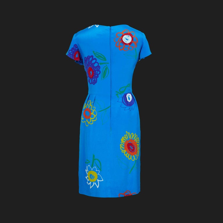 Product Details: Lanvin - 1980s Vintage - Printed Silk Dress - Front Pleating Detail - Turquoise Blue / Main Dress - Mustard, Grey, Orange, Red, Green / Floral Print - Back Zipper Fasten - Fully Lined
Label: Lanvin - Paris
Era: 1980s Vintage
Fabric