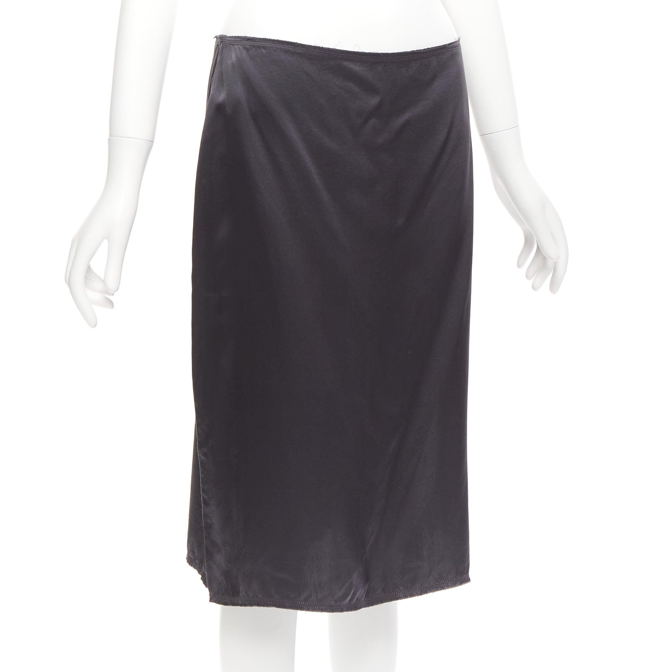 LANVIN 2004 100% silk grey raw edge fabric button low waist midi skirt FR38 M
Reference: CELG/A00265
Brand: Lanvin
Designer: Alber Elbaz
Collection: 2004
Material: Silk
Color: Grey
Pattern: Solid
Closure: Button
Extra Details: Side slit and side