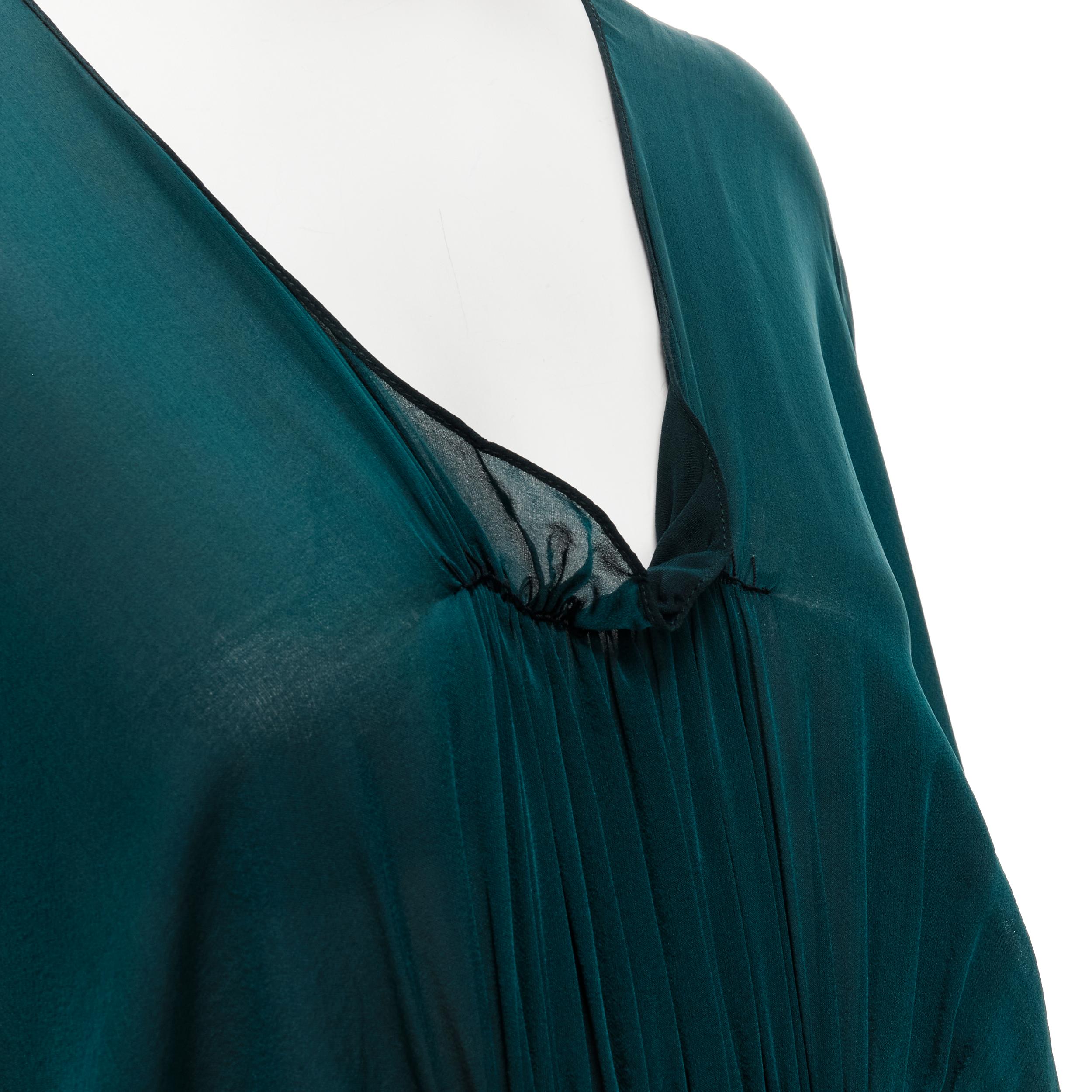 LANVIN 2005 Alber Elbaz green silk elastic ruched kimono sleeve dress FR38 S 
Reference: CELG/A00182 
Brand: Lanvin 
Designer: Alber Elbaz 
Collection: 2005 
Material: Silk 
Color: Green 
Pattern: Solid 
Closure: Drawstring 
Extra Detail: Scoop
