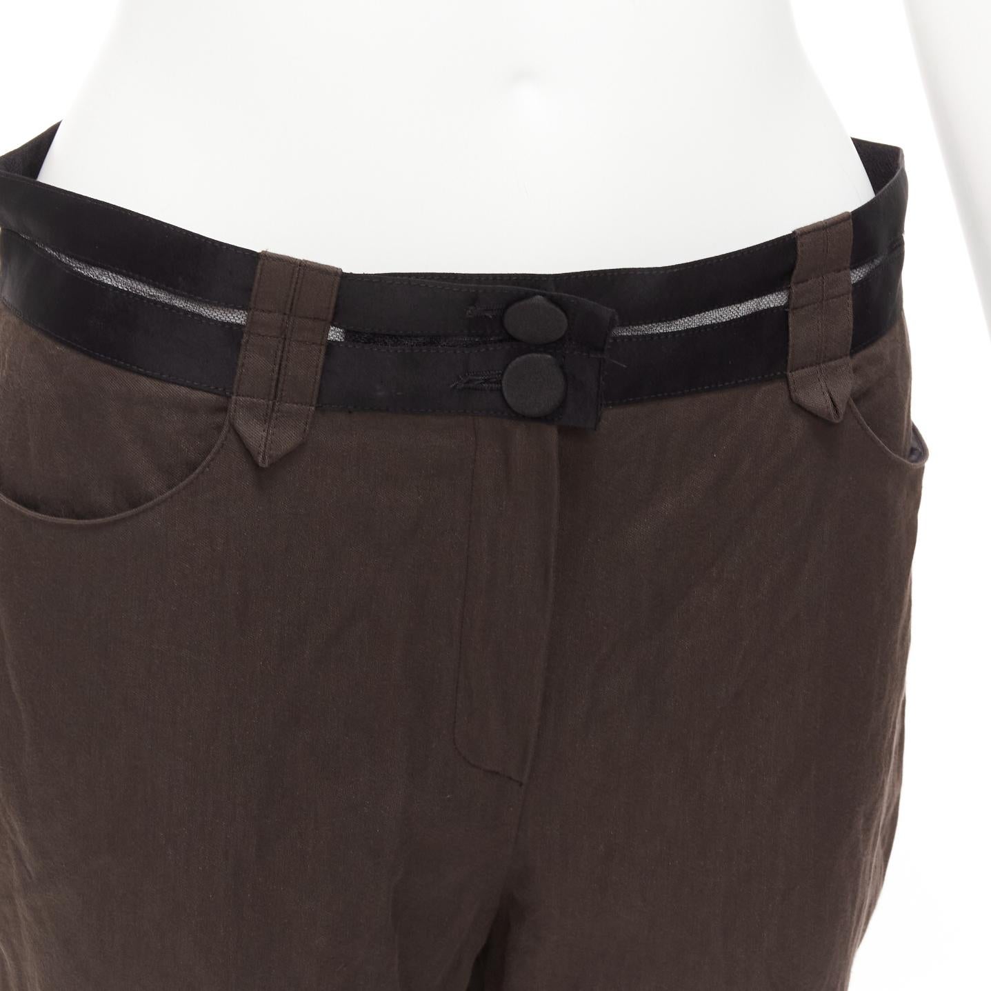 LANVIN 2005 brun foncé noir coton mélangé ceinture transparente pantalon crop FR40 L
Référence : CELG/A00442
Marque : Lanvin
Designer : Alber Elbaz
Collectional : 2005
Matière : Coton, mélange
Couleur : marron, noir
Motif : Solide
Fermeture :