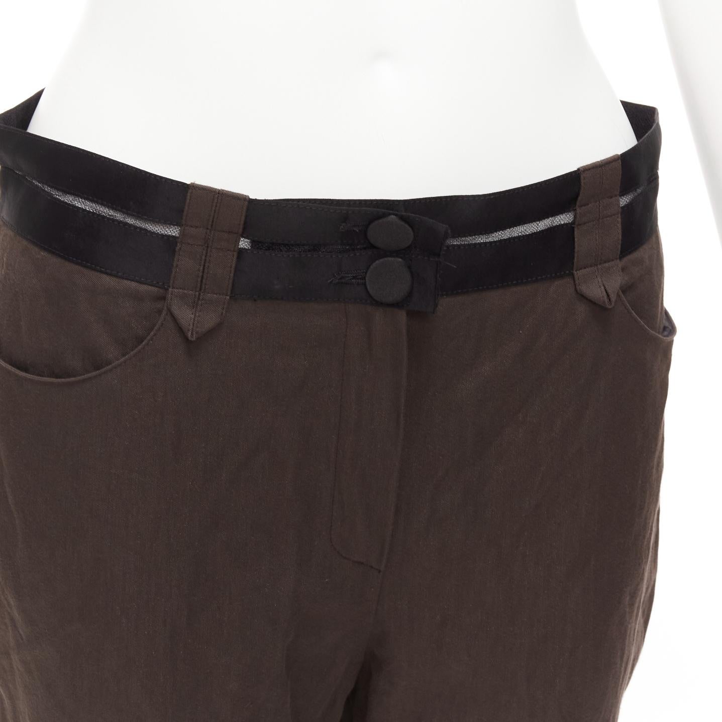 LANVIN 2005 dark brown black cotton blend sheer waistband crop pants FR40 L
Reference: CELG/A00442
Brand: Lanvin
Designer: Alber Elbaz
Collection: 2005
Material: Cotton, Blend
Color: Brown, Black
Pattern: Solid
Closure: Zip Fly
Extra Details: Sheer