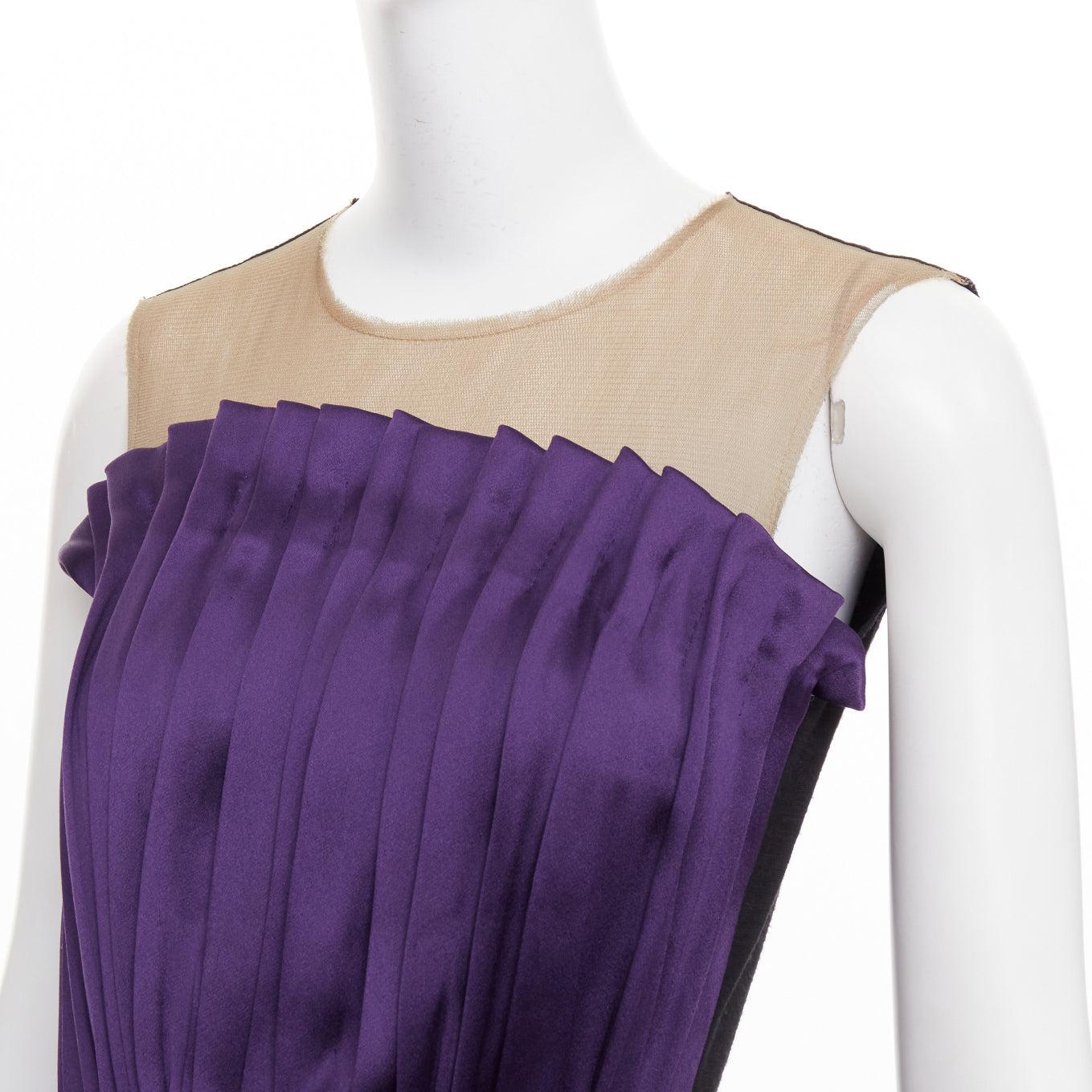 LANVIN 2006 Runway purple nude silk gathered panelled cocktail dress FR36 S
Reference: CC/A00488
Brand: Lanvin
Designer: Alber Elbaz
Collection: Fall/Winter Show 2006 - Look 35 - Runway
Material: Silk
Color: Purple, Nude
Pattern: Solid
Closure: