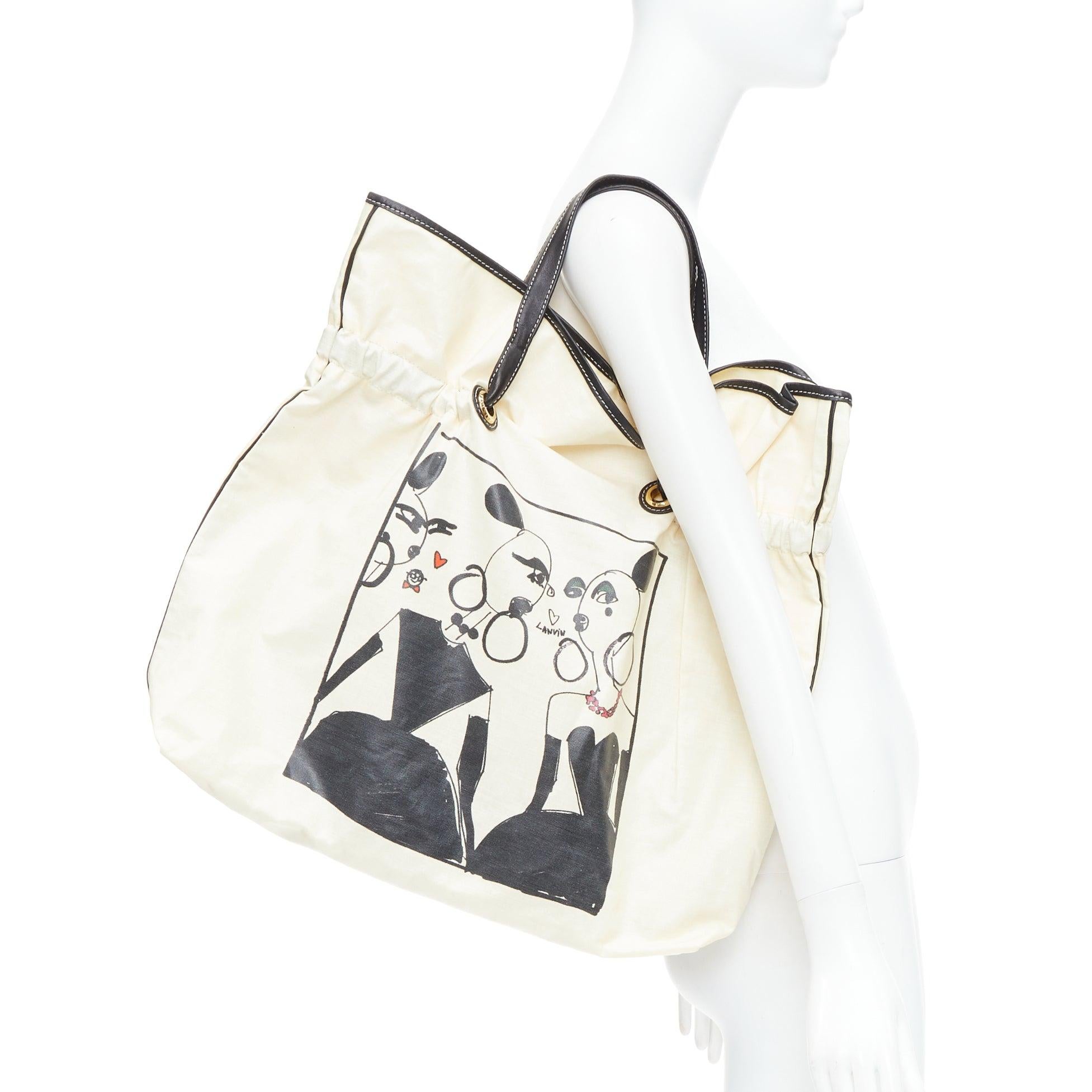 LANVIN 2008 beige coated canvas black drawstring cartoon print tote bag
Reference: ANWU/A01338
Brand: Lanvin
Designer: Alber Elbaz
Collection: 2008
Material: Canvas, Leather
Color: Beige, Black
Pattern: Cartoon
Closure: Drawstring
Lining: Beige