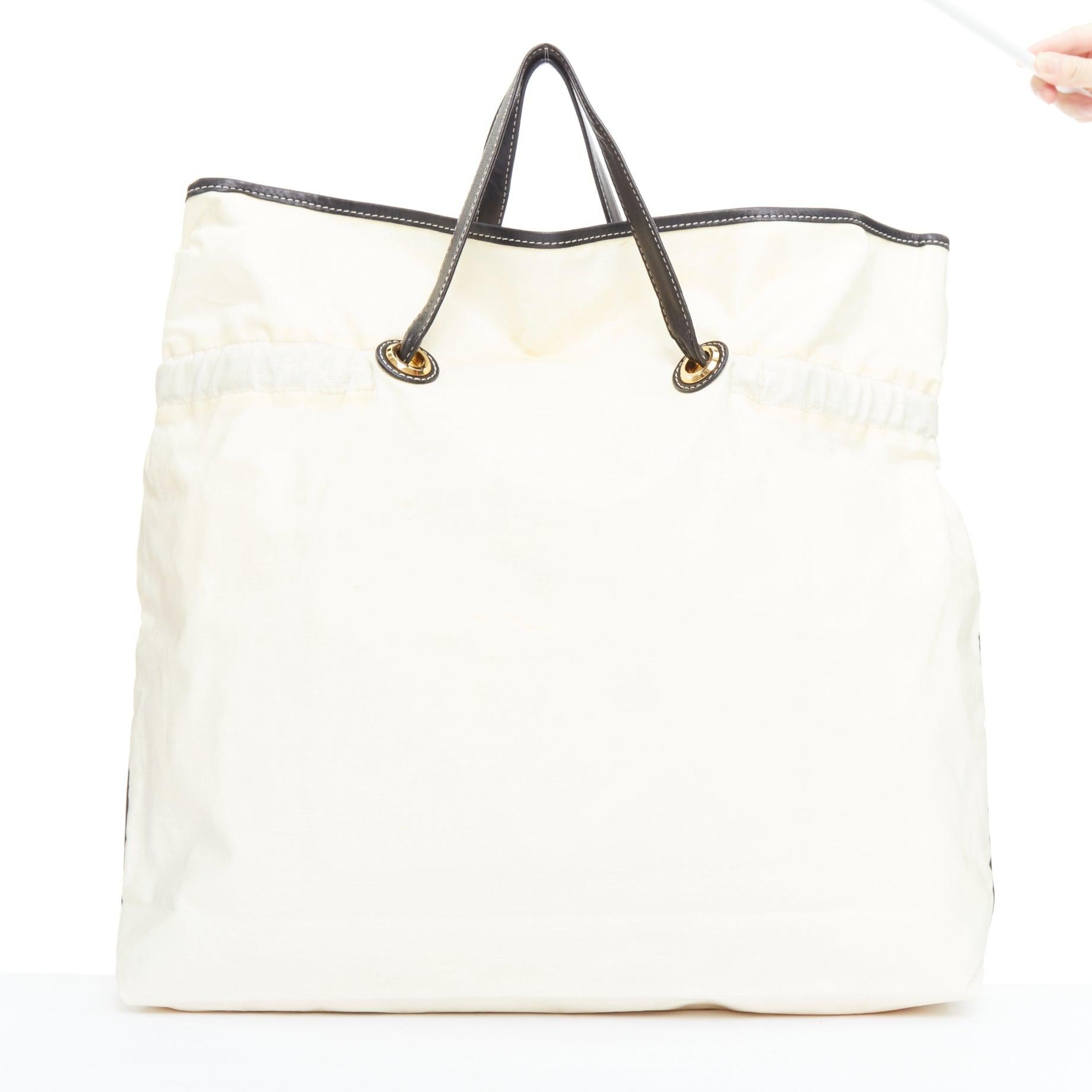 Women's LANVIN 2008 beige coated canvas black drawstring cartoon print tote bag