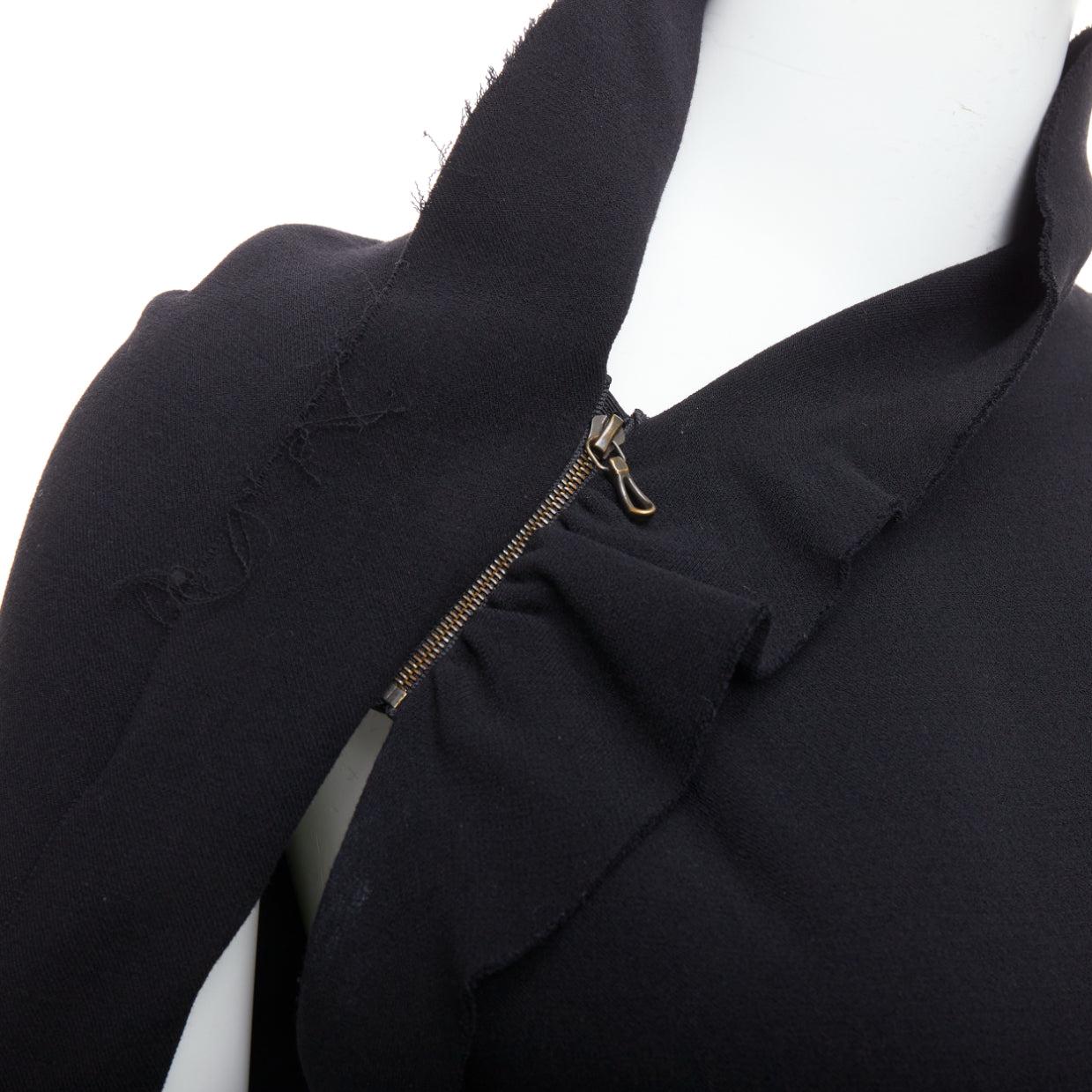 LANVIN 2010 black wool asymmetric zip drape mini dress FR36 S
Reference: MECG/A00044
Brand: Lanvin
Designer: Alber Elbaz
Collection: 2010
Material: Wool, Blend
Color: Black
Pattern: Solid
Closure: Zip
Extra Details: Draped back.
Made in: