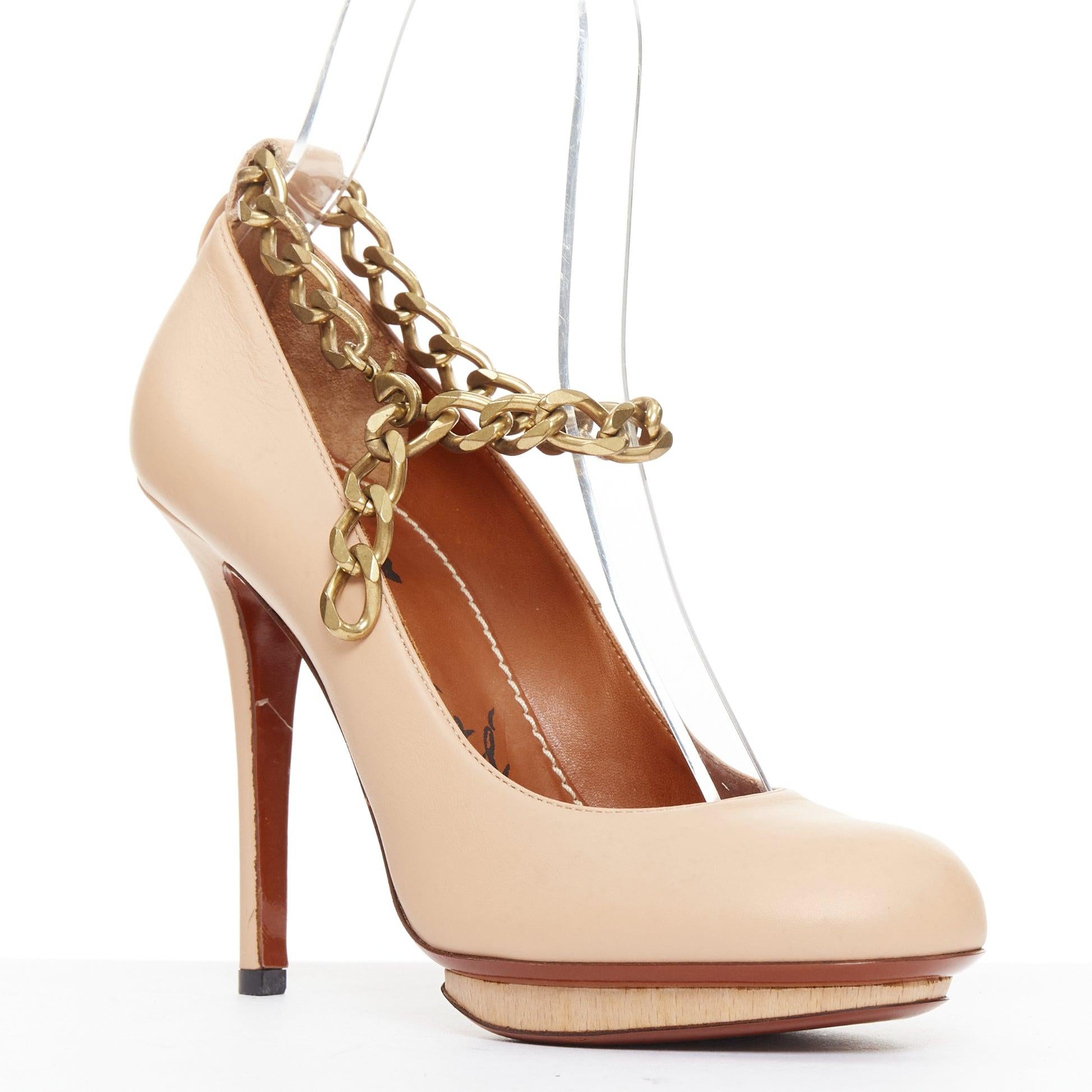 LANVIN 2010 Runway nude leather gold chunky chain wooden platform pumps EU36.5
Reference: SNKO/A00649
Brand: Lanvin
Designer: Alber Elbaz
Collection: 2010
Material: Leather
Color: Nude, Gold
Pattern: Solid
Closure: Ankle Strap
Lining: Brown
