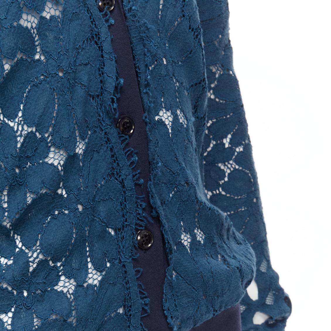 LANVIN 2015 blue silk cotton floral lace sheer long sleeve V neck cardigan S
Reference: DYTG/A00050
Brand: Lanvin
Designer: Alber Elbaz
Collection: 2015
Material: Silk, Cotton
Color: Blue, Navy
Pattern: Lace
Closure: Button
Extra Details: Jersey rib