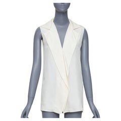 LANVIN 2015 cremefarbene Seide mit breitem Revers und tiefem Ausschnitt ärmelloses Blusentop FR34 XS